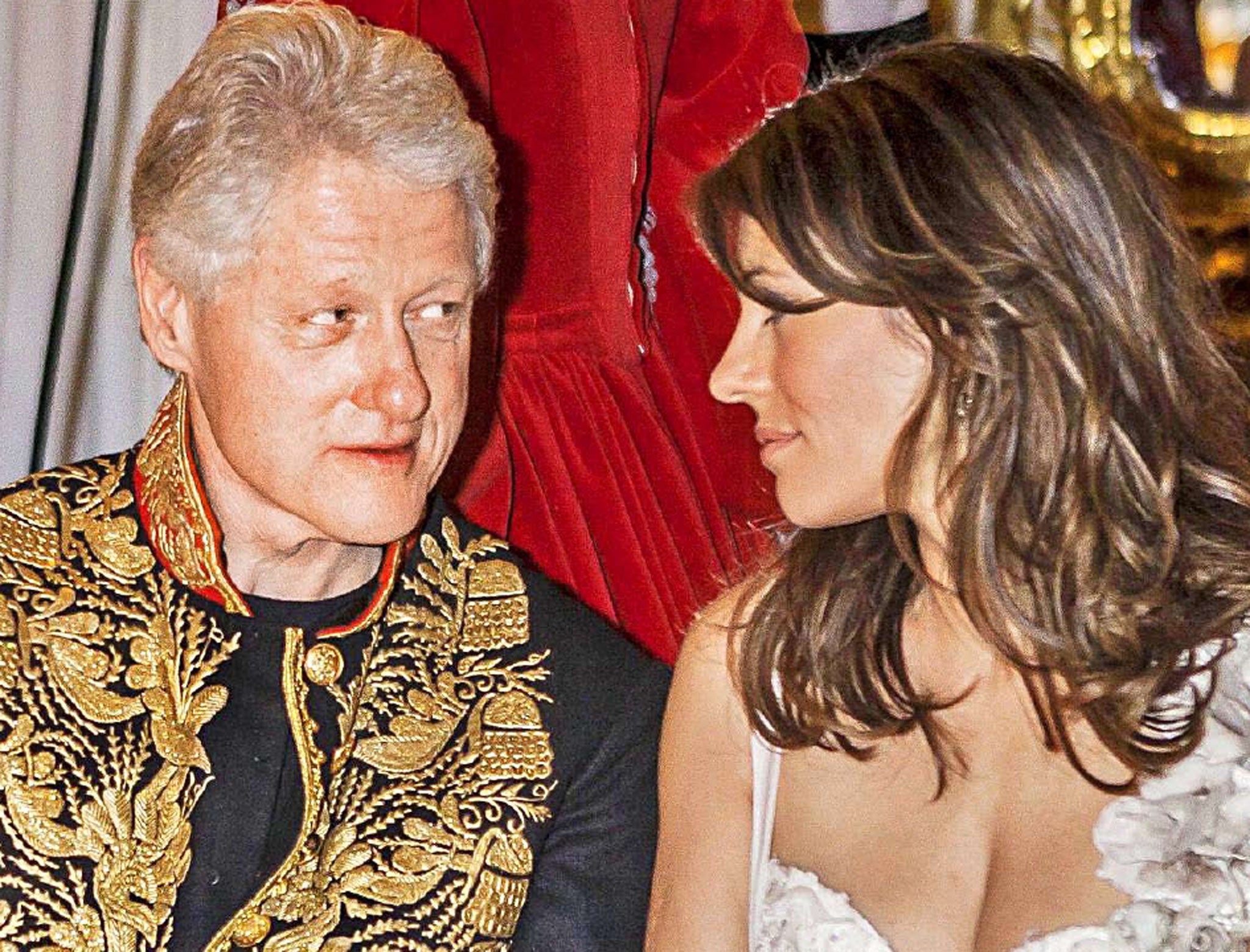 Coming to the braid of the party: Bill Clinton and Elizabeth
Hurley in St Petersburg in 2005