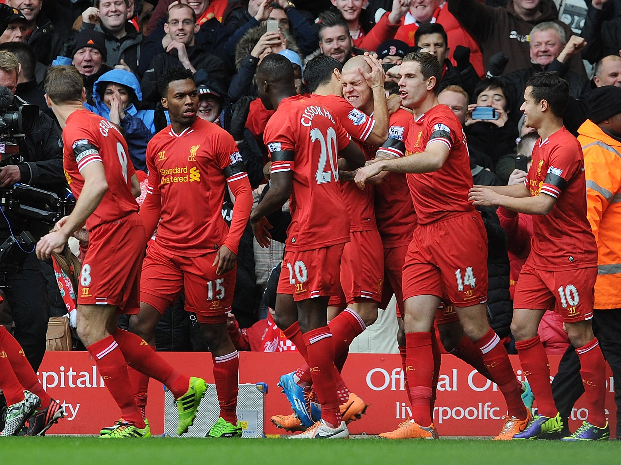 Liverpool players celebrate the 5-1 victory over Arsenal at Anfield