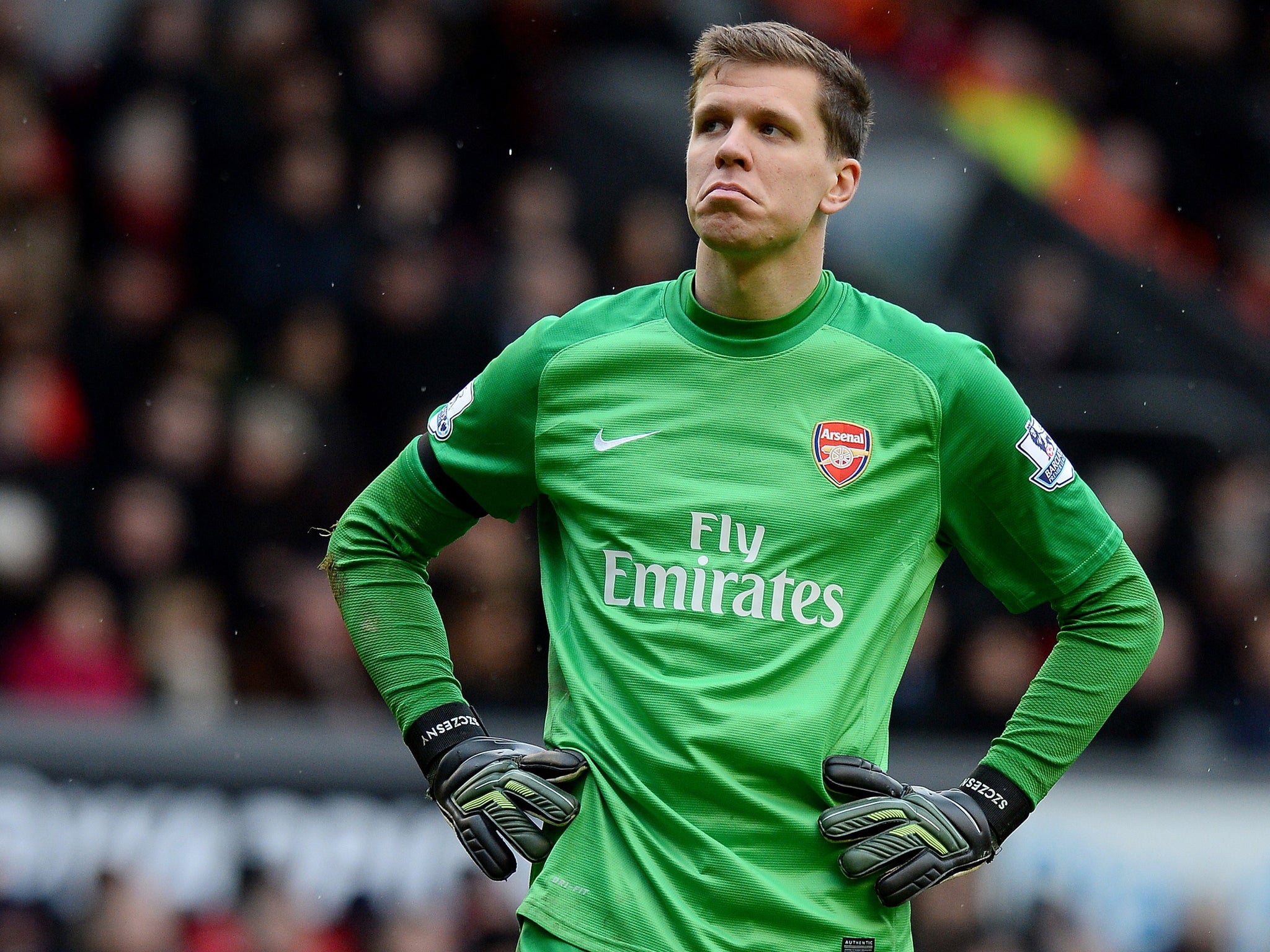 Wojciech Szcesny looks on in despair at Anfield