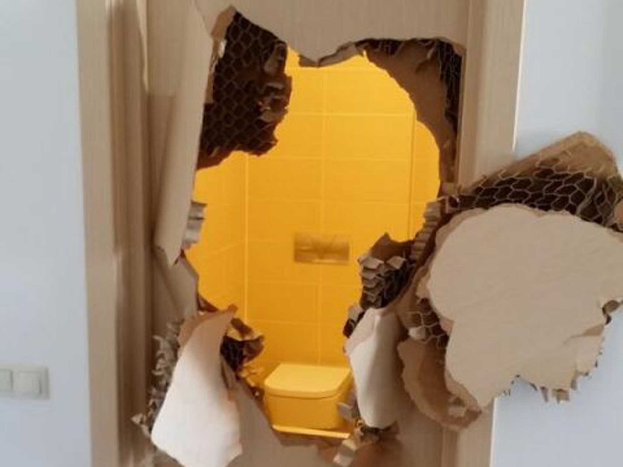 The remains of one bathroom door which was smashed through when an American athlete got stuck