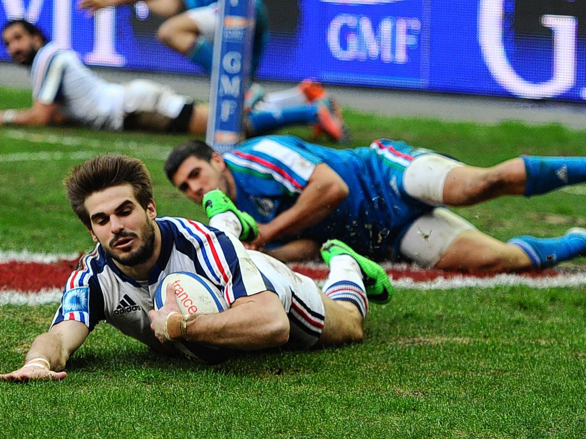 Hugo Bonneval of France scores a try during the Six Nations match against Italy