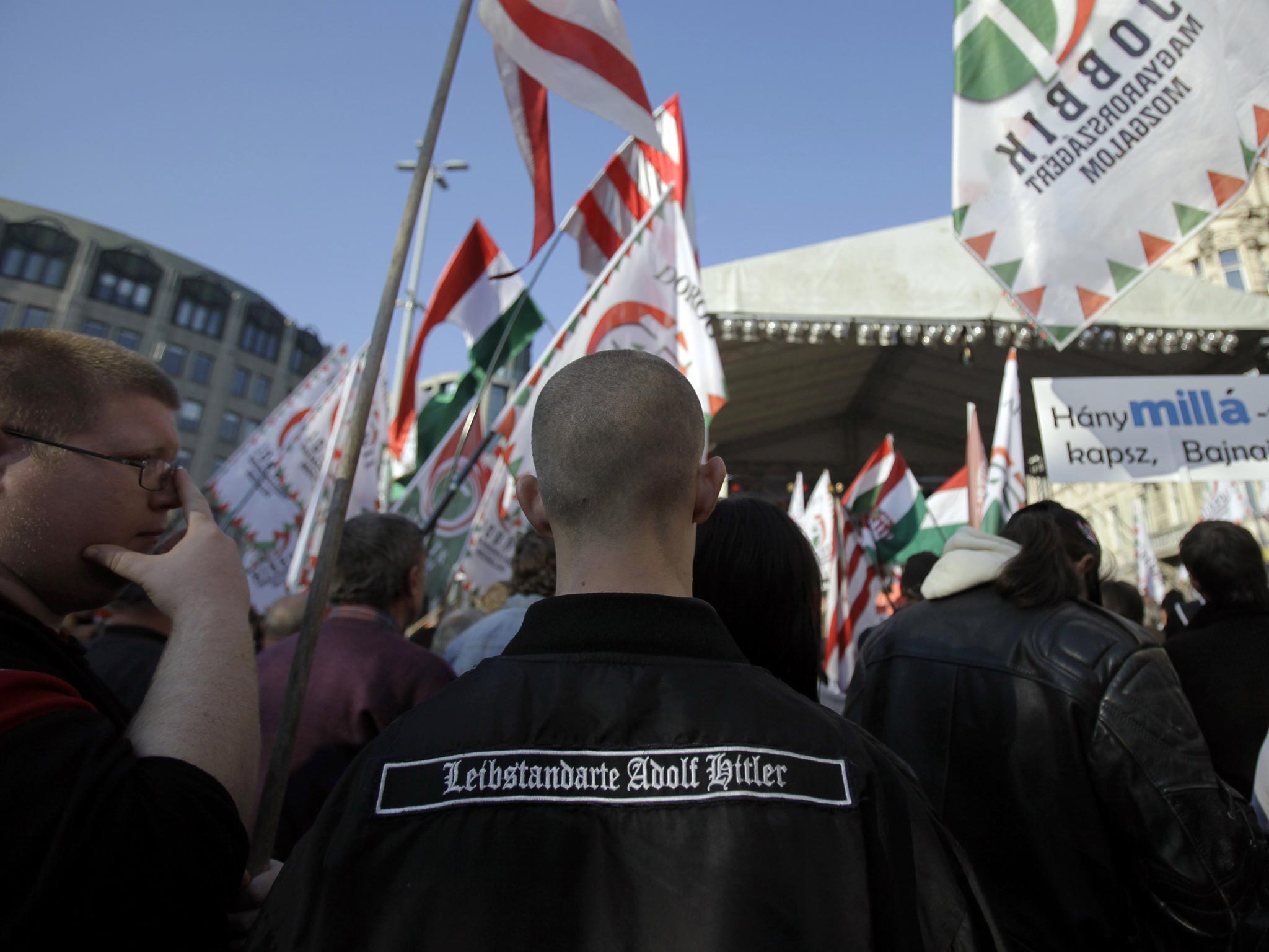 Far-right wing sympathizers listen to an official speech of ultra-nationalist parliament