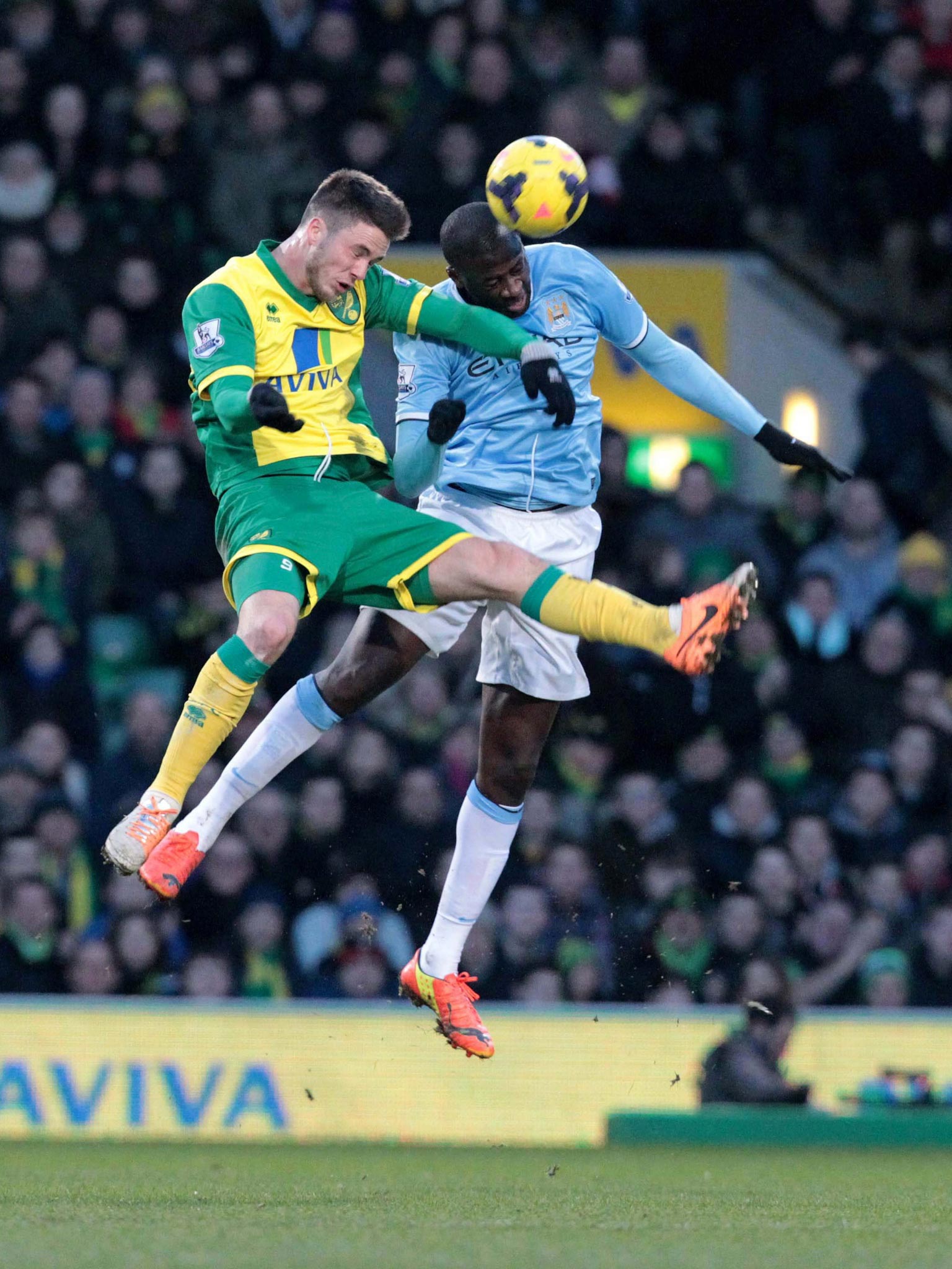 Yaya Touré does battle with Ricky van Wolfswinkel