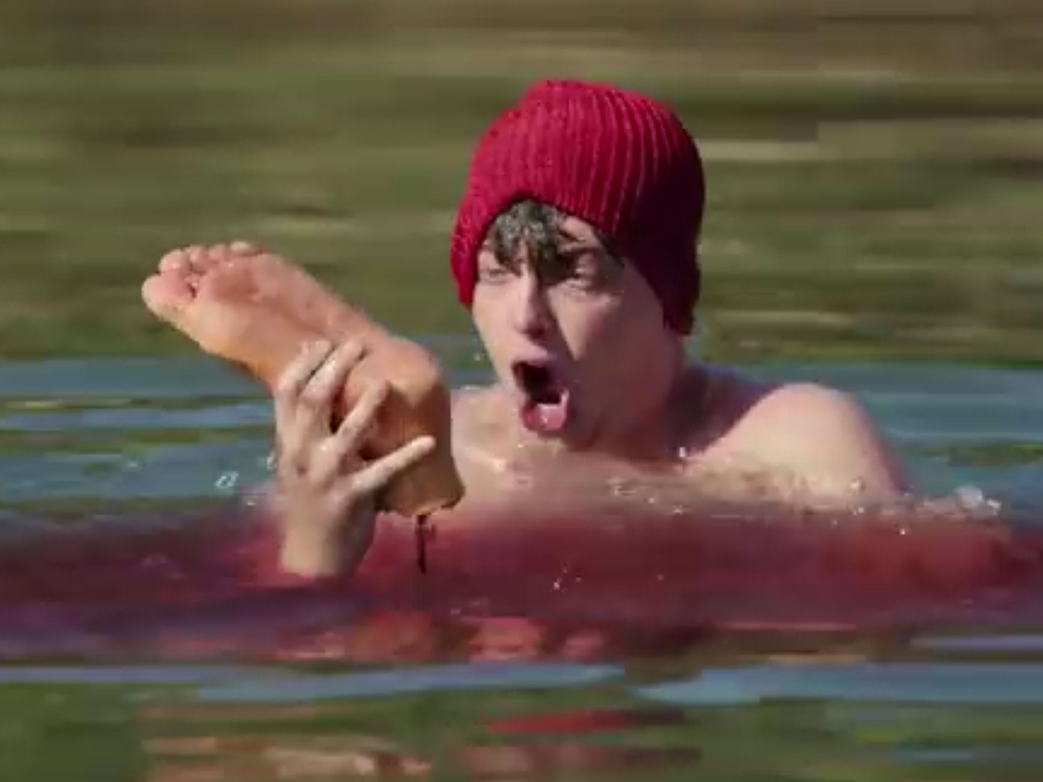 Hipster beanie teen is atttacked by the 'zombeavers' in Jordan Rubin's horror comedy