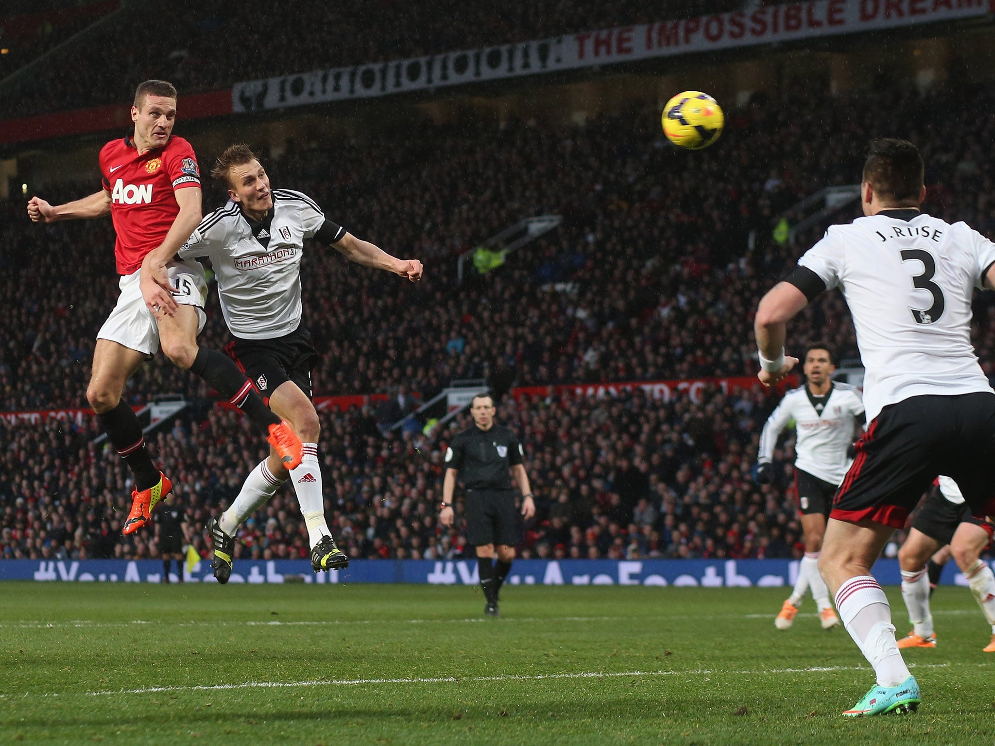 Dan Burn challenges Nemanja Vidic at Old Trafford