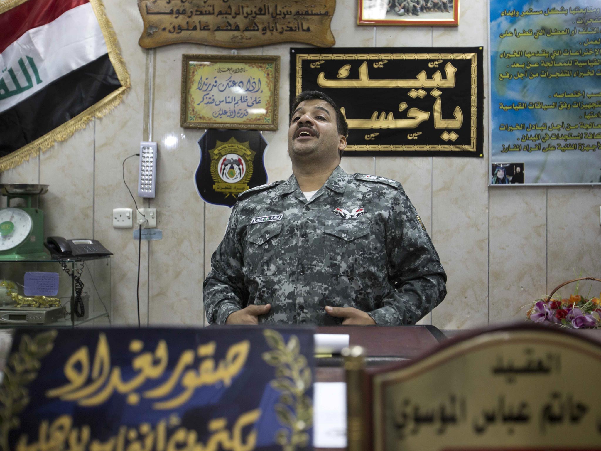 Lieutenant Colonel Riyadh laughs as he is asked questions about the risks involved in working with The Hawks