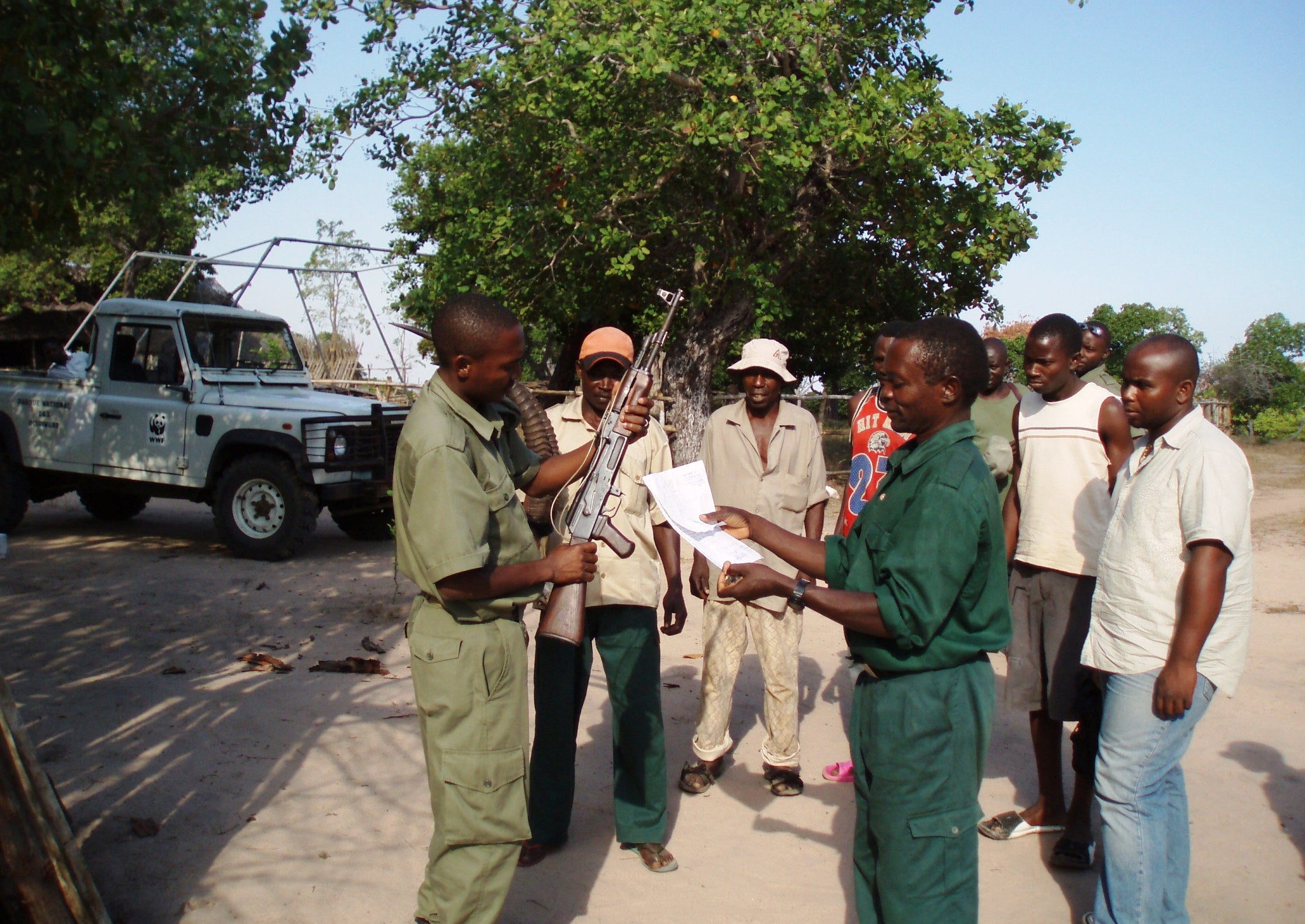 Automatic weapon captured by Mareja Community Rangers officially handed over to the chief Park Ranger