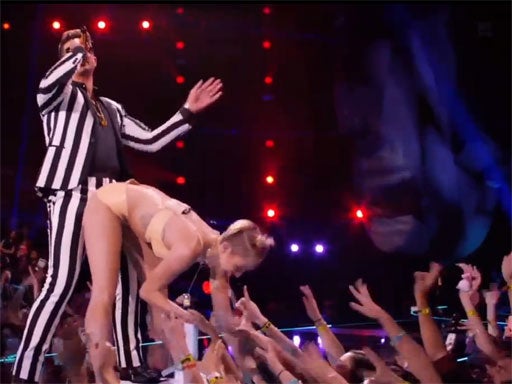 Miley Cyrus 'twerks' at the MTV awards with Robin Thicke in 2013
