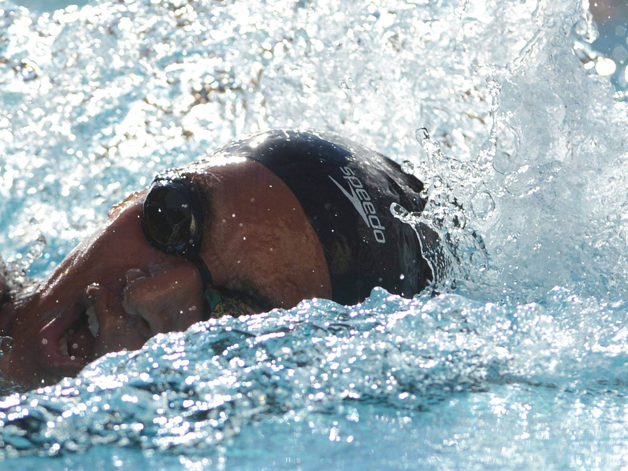 A woman swims in Brazil. Sony have targeted their waterproof MP3 player at swimmers.