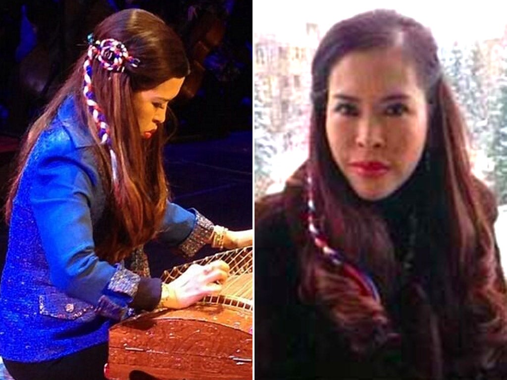 Princess Chulabhorn Mahidol, seen wearing red, white and blue hair ties, apparently in support of the protesters