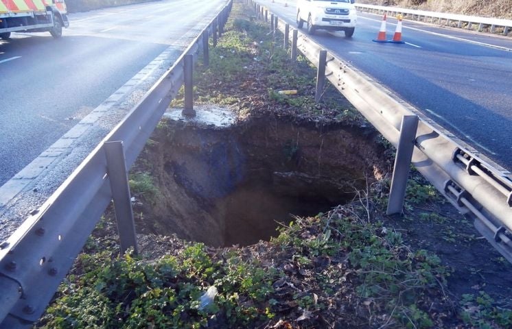 A 15ft-deep hole which appeared in the central reservation on a busy section of motorway on the M2 in north Kent and was shut between junction 5 near Sittingbourne and junction 6 south of Faversham.