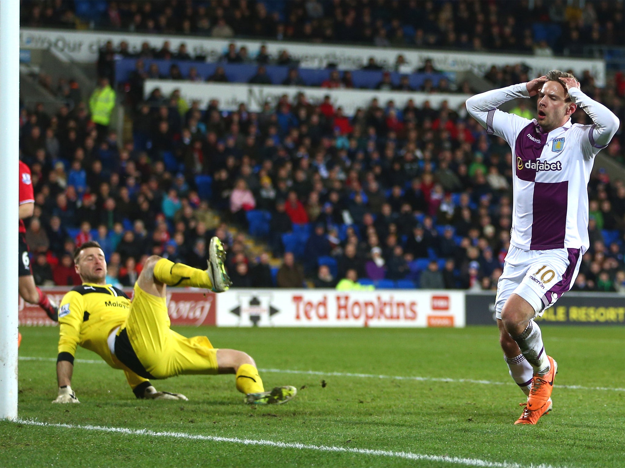 Cardiff's David Marshall makes a last minute save from Andreas Weimann