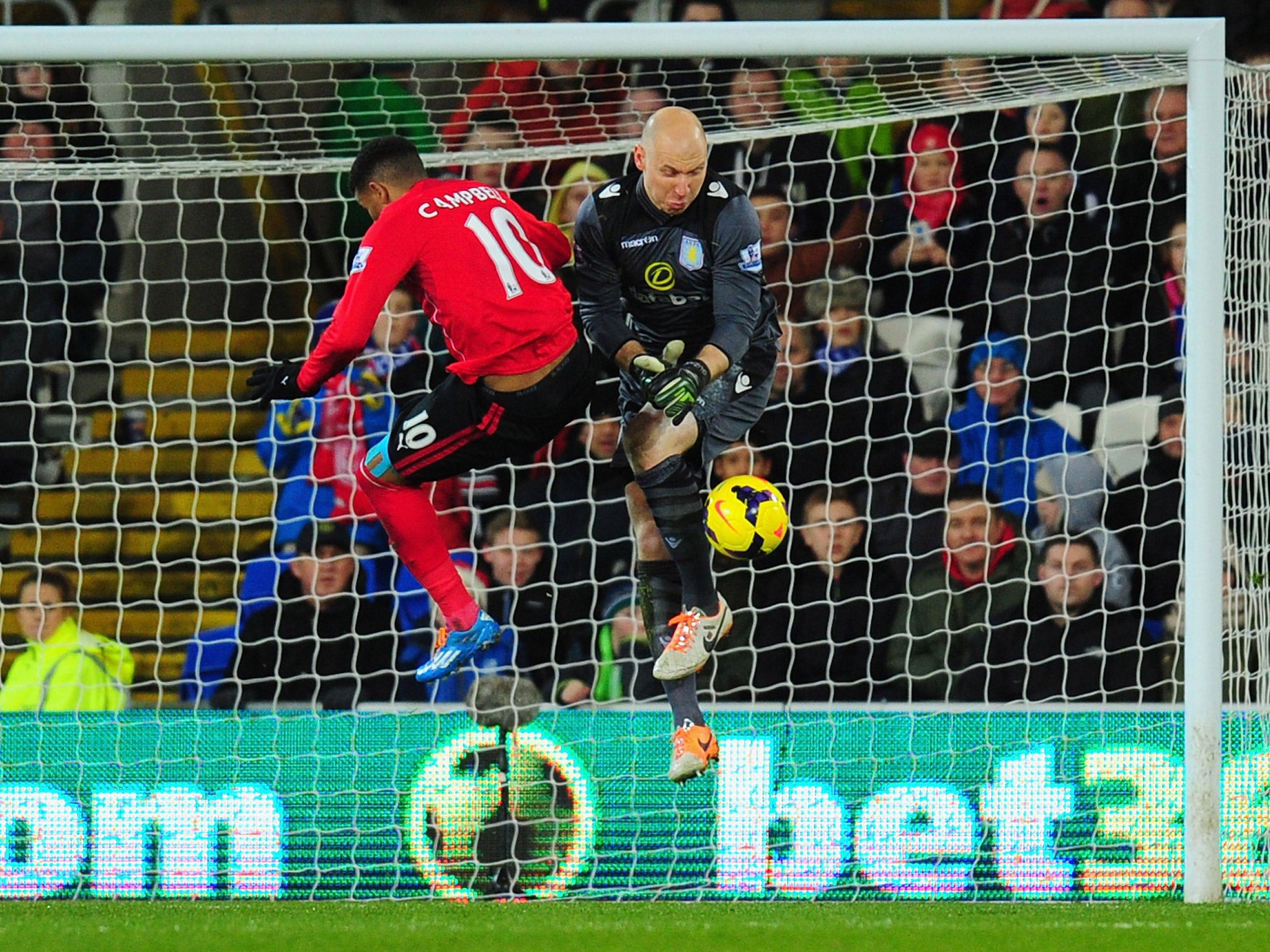 Fraizer Campbell causes an awkward moment for Villa keeper Brad Guzan (Getty)