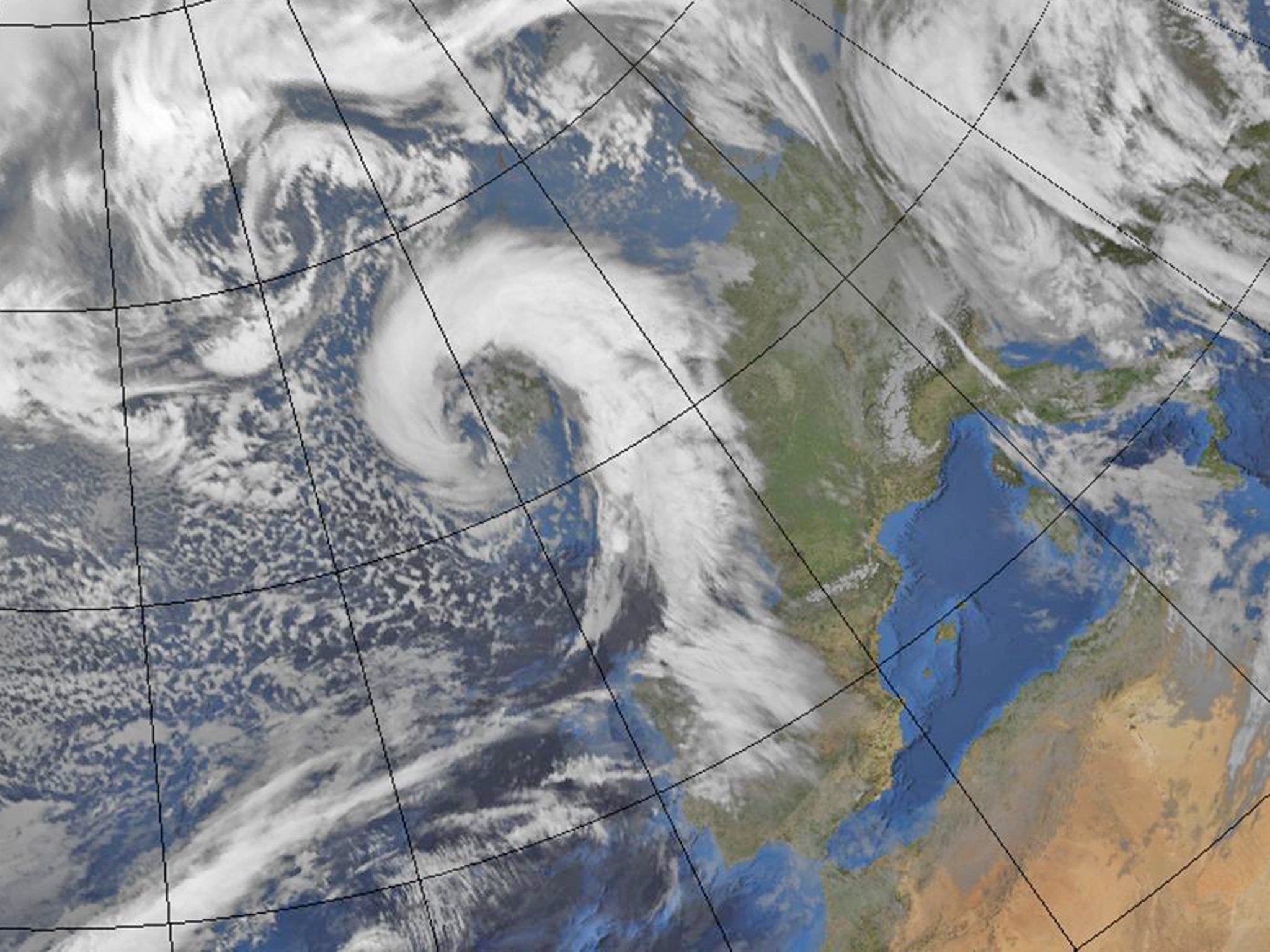 A satellite image taken today issued by the Met Office showing the UK as a red weather warning has been issued