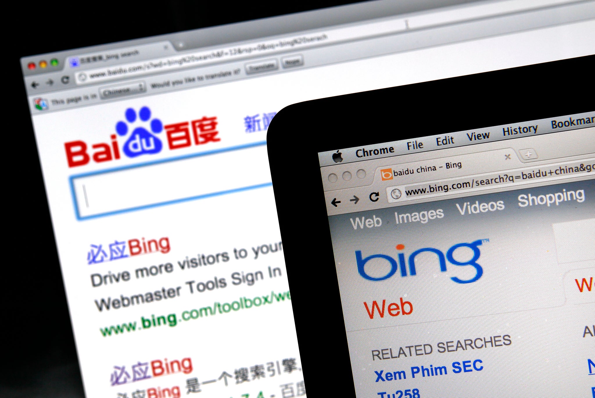 A photo illustration shows the websites of search engines Baidu and Bing on computer screens in Shanghai July 5, 2011