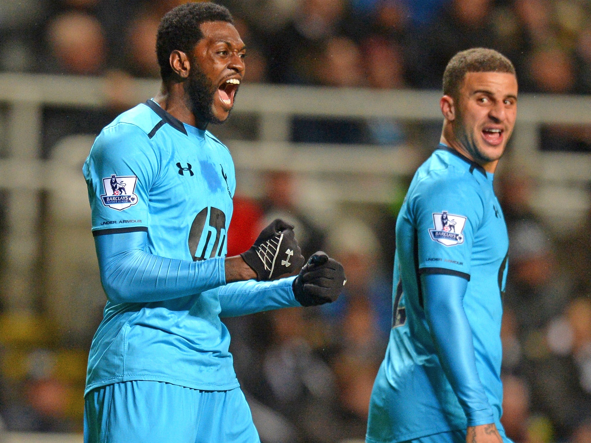 Emmanuel Adebayor celebrates opening the scoring for Spurs