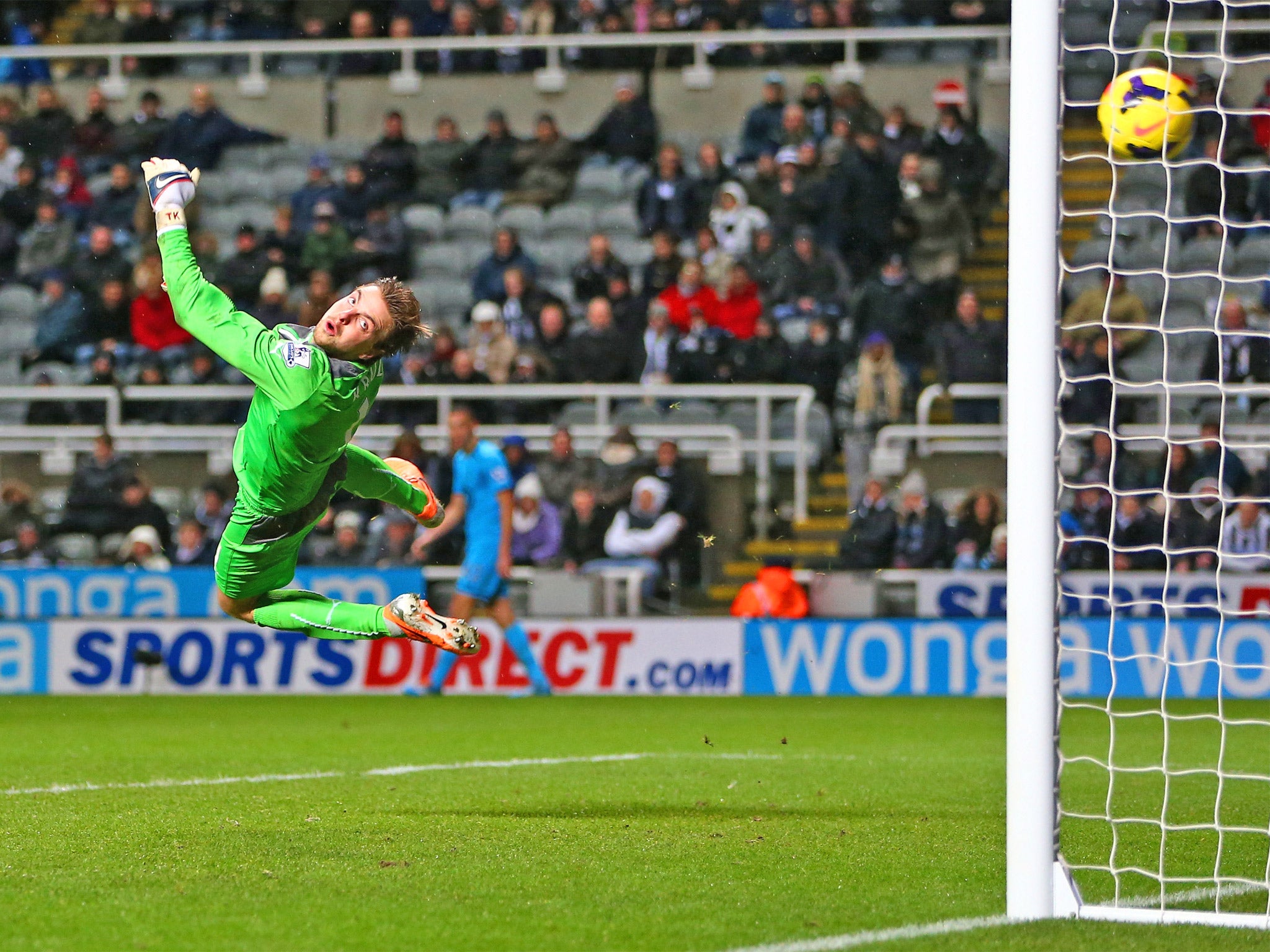 Newcastle keeper Tim Krul dives but fails to stop Nacer Chadli's fine effort (Getty)