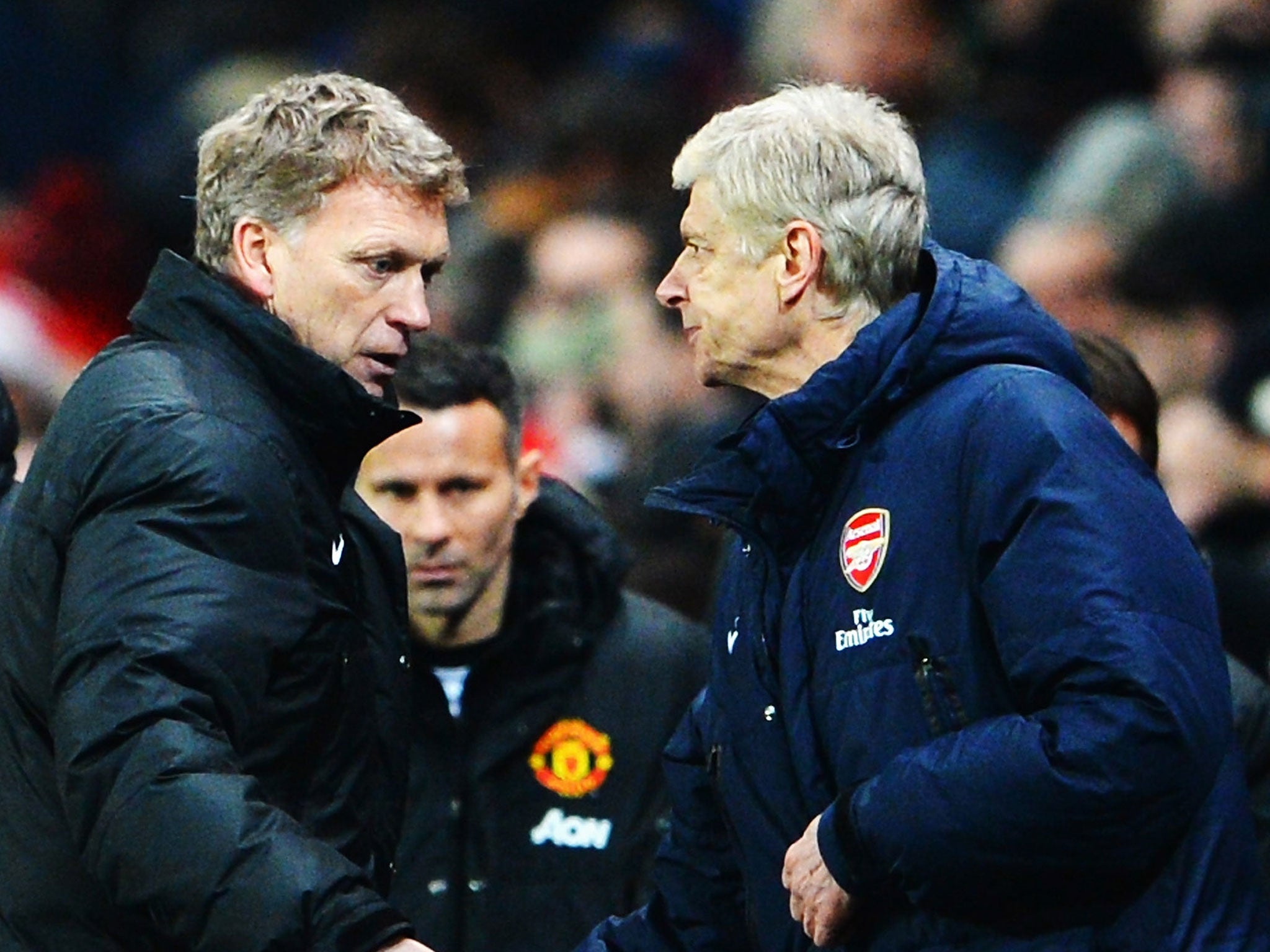 David Moyes and Arsene Wenger shake hands at the end of the match