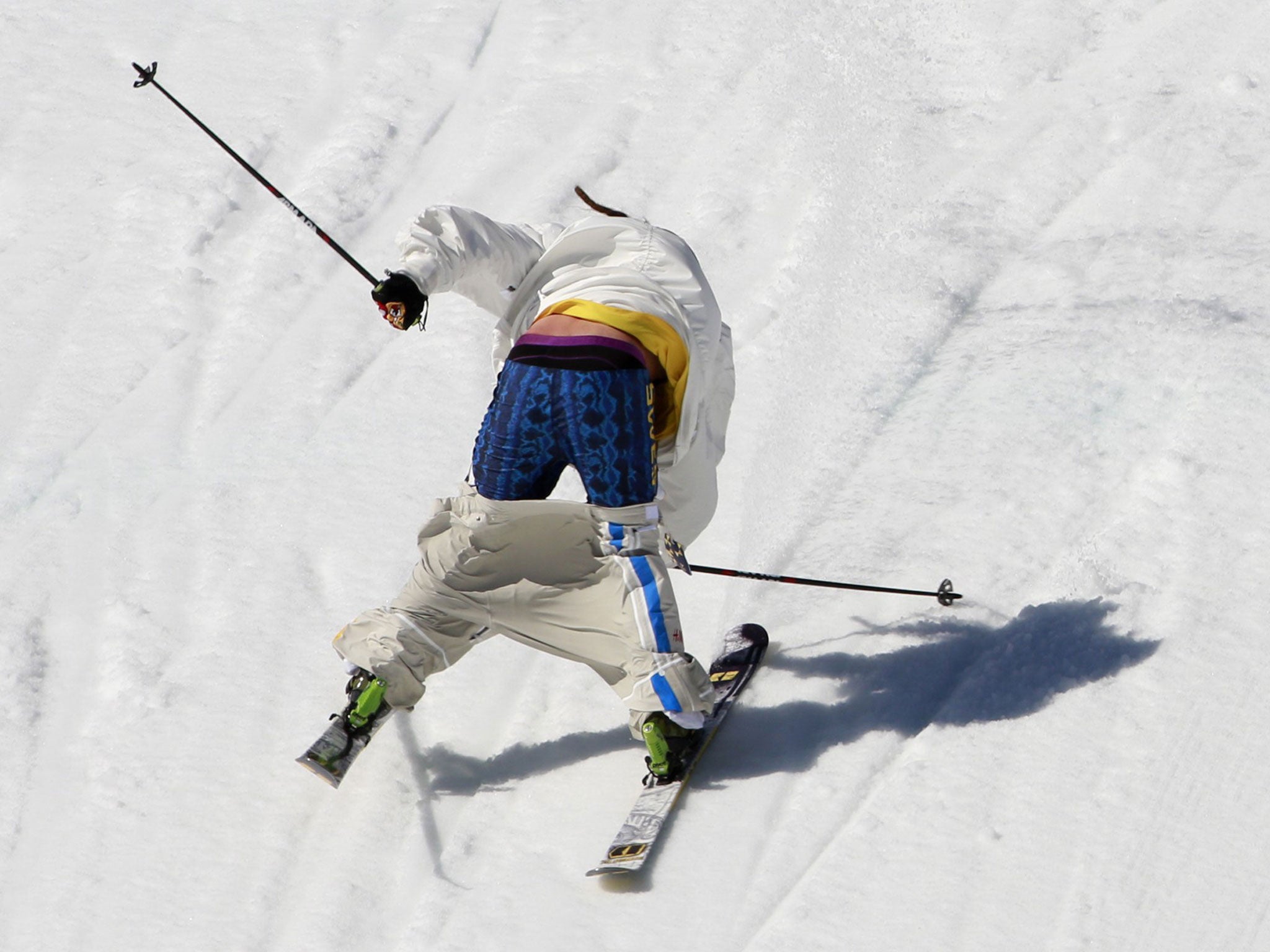 Sweden's Henrik Harlaut barely lands on his first run before crashing out during the men's ski slopestyle qualifying at the Sochi 2014 Winter Olympics