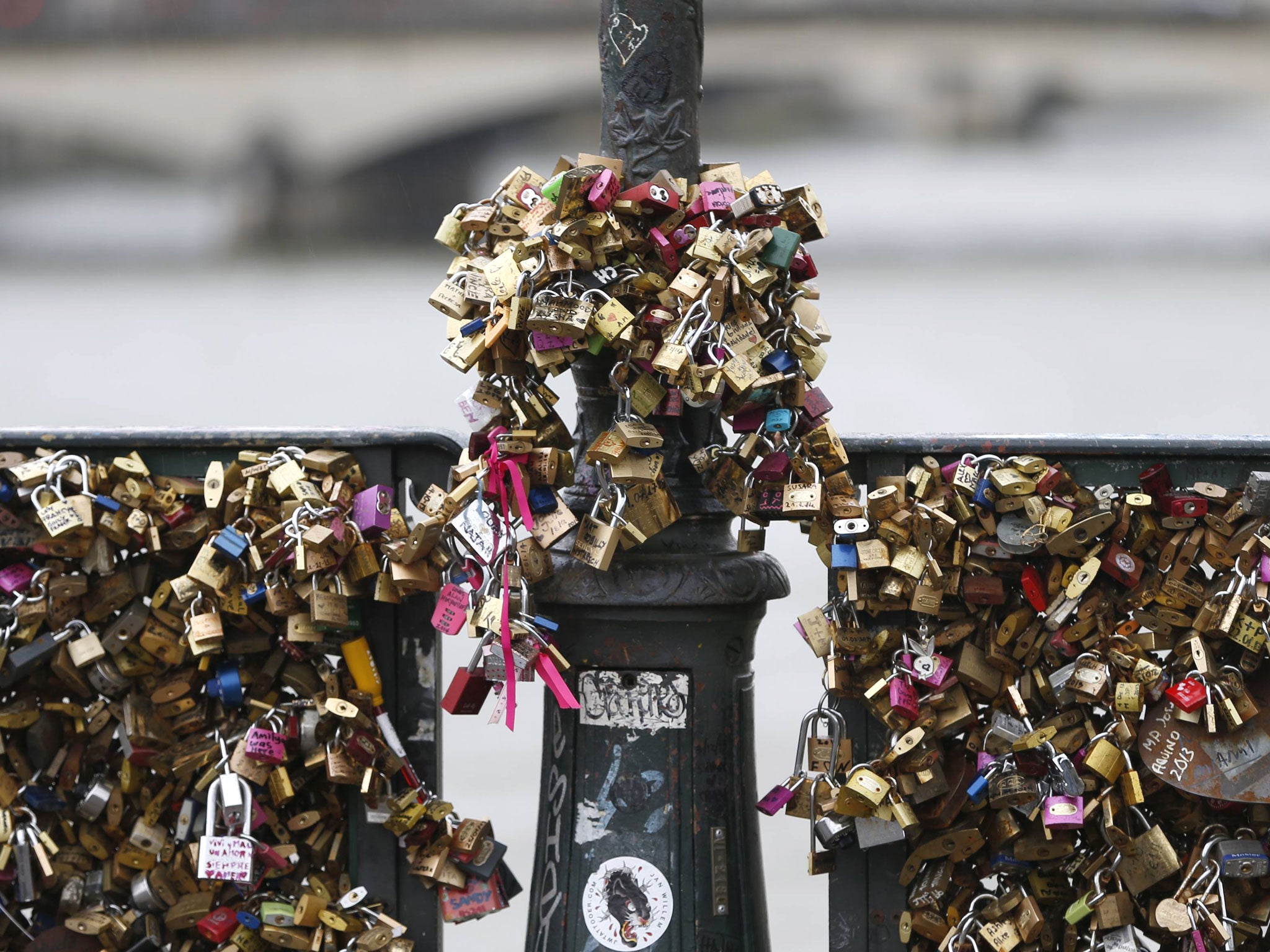 The love padlocks have multiplied to damaging levels on Paris bridges