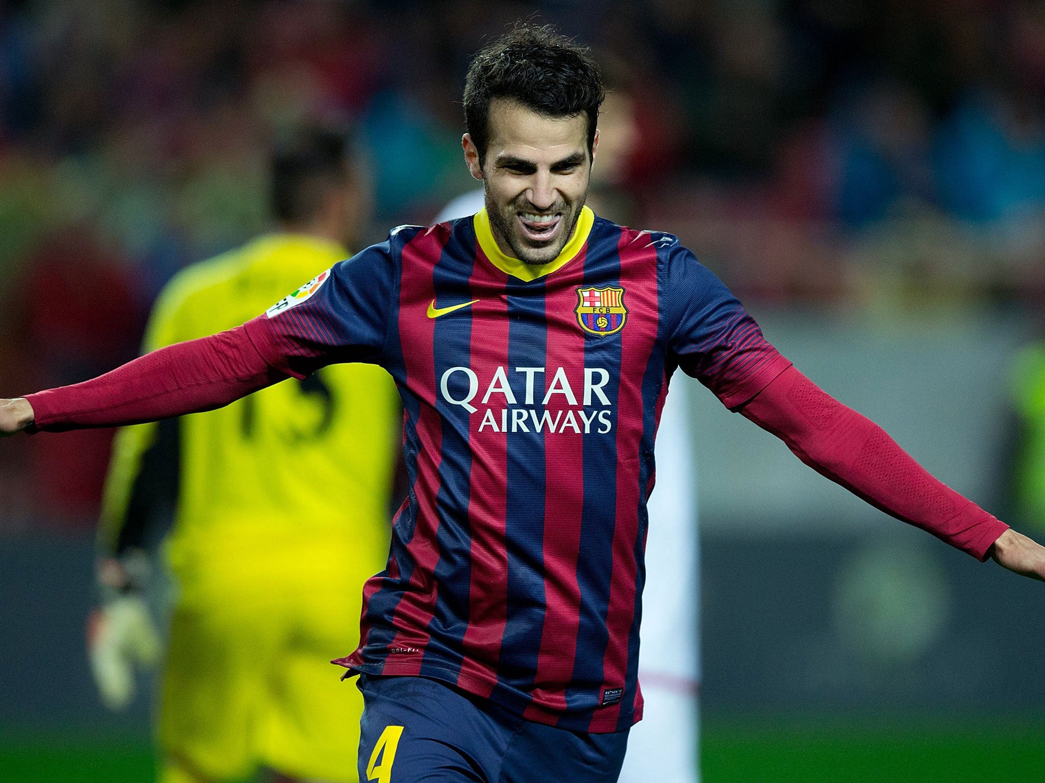 Cesc Fabregas celebrates his goal for Barcelona against Seville last weekend