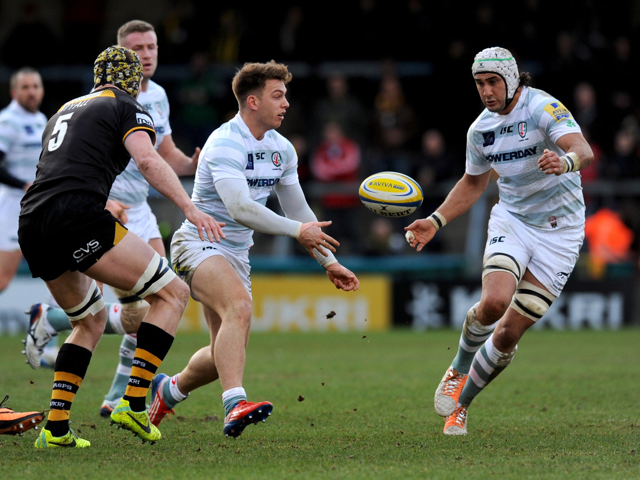 Alex Lewington passes to Blair Cowan during London Irish's 23-20 win over Wasps