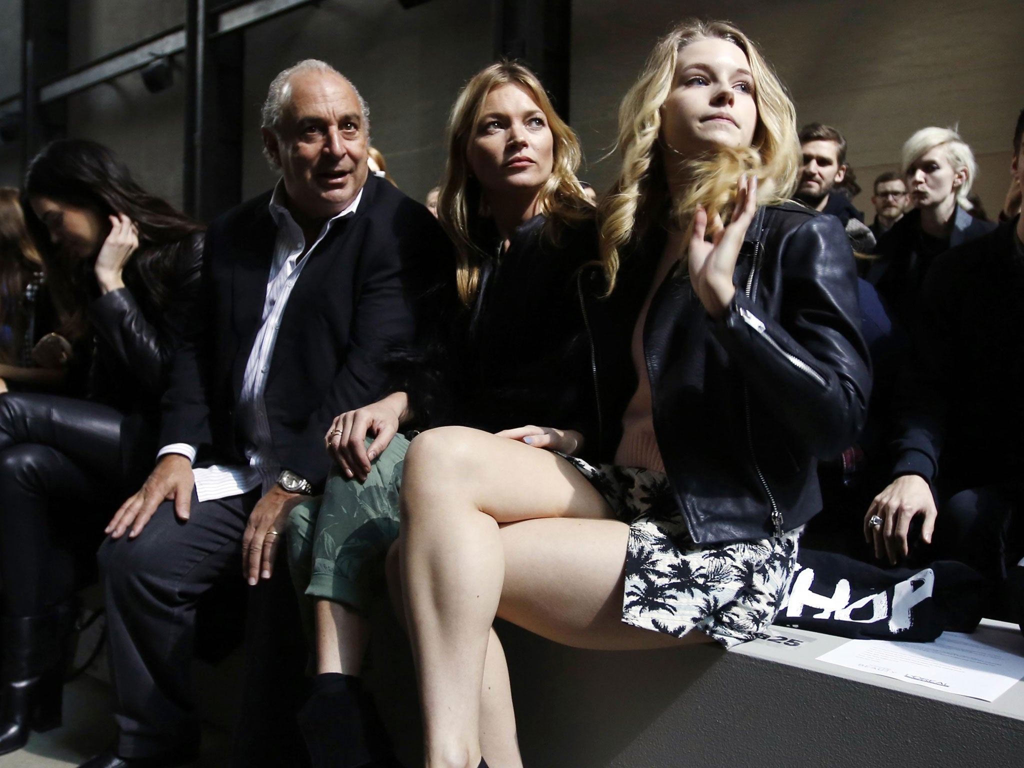 Philip Green, Kate Moss and younger sister, Lottie Moss, on the Topshop front row (Reuters)