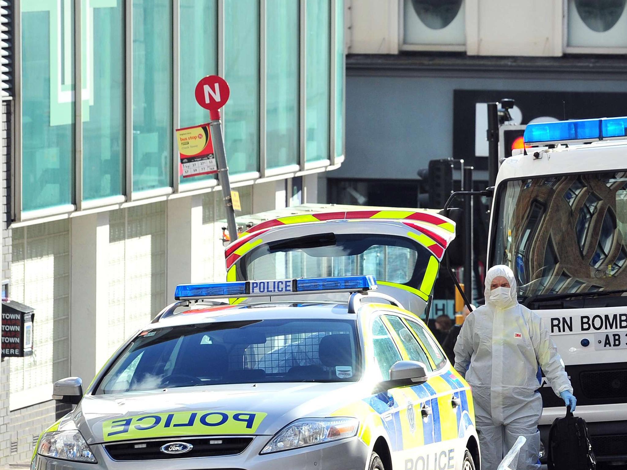 A bygone age: bomb disposal experts at the scene of a suspect package in Brighton last week