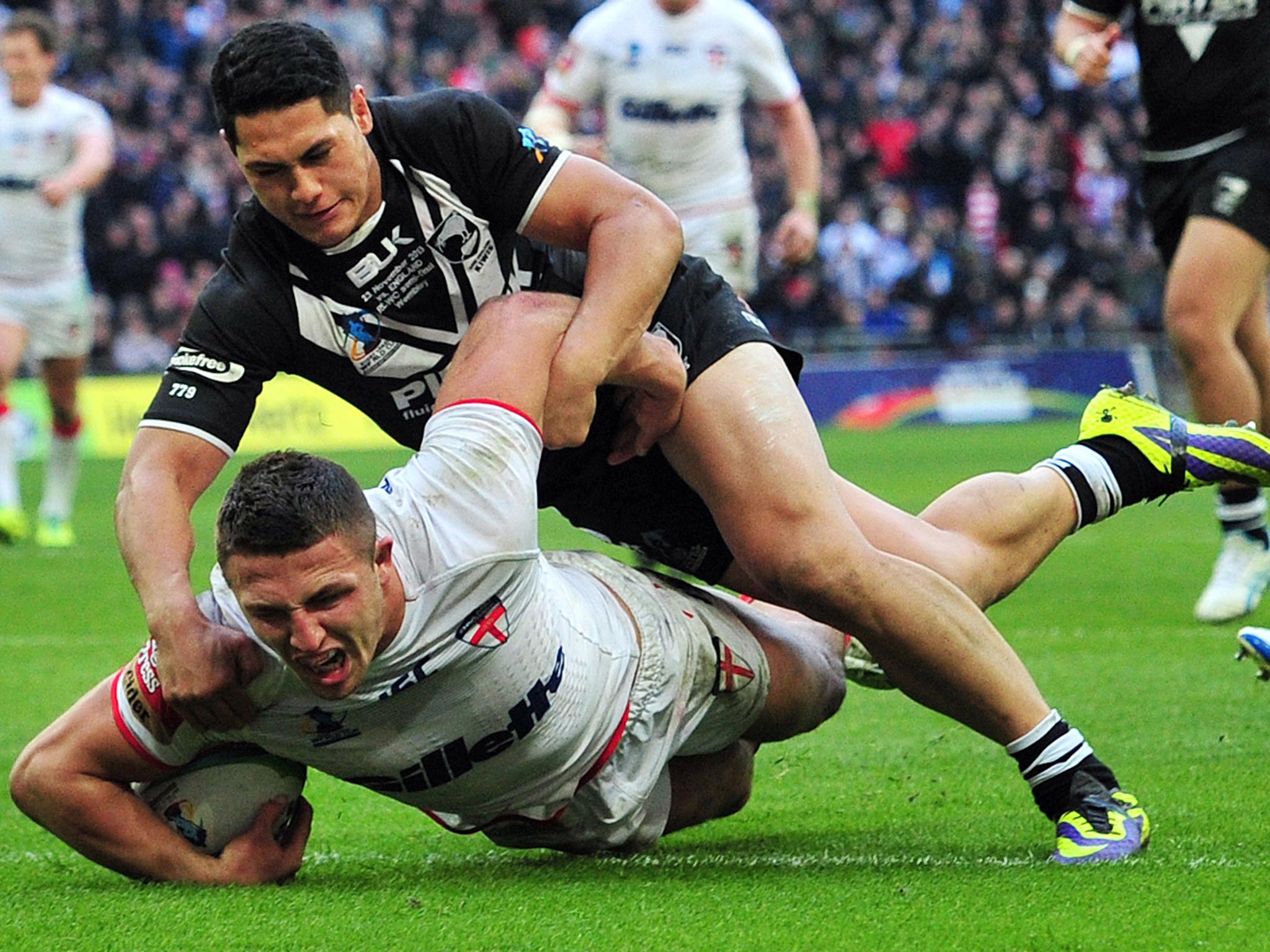 Sam Burgess scoring a try for the England rugby league side in the World Cup last year