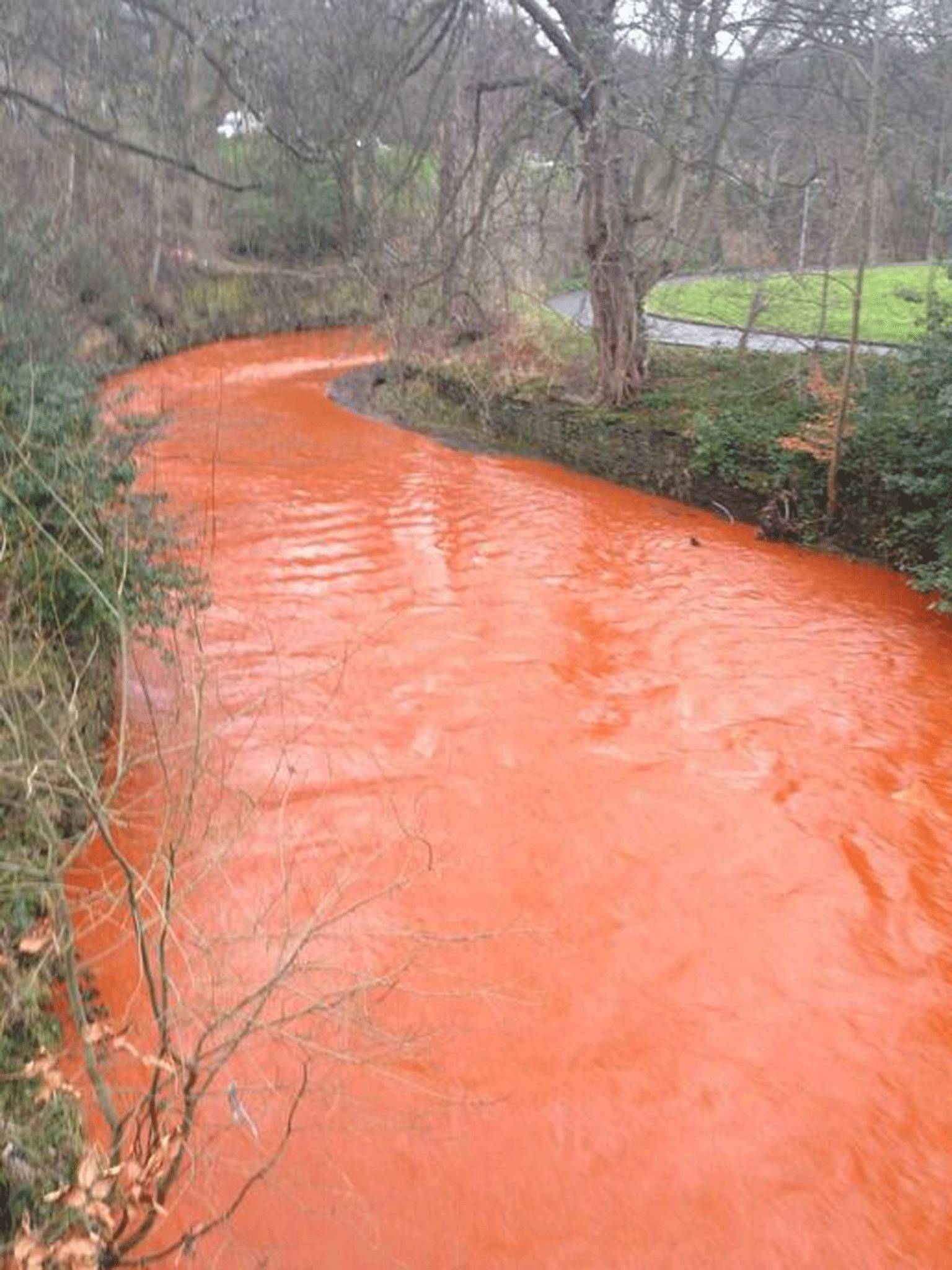 The River Holme's orange colour was caused by iron deposits