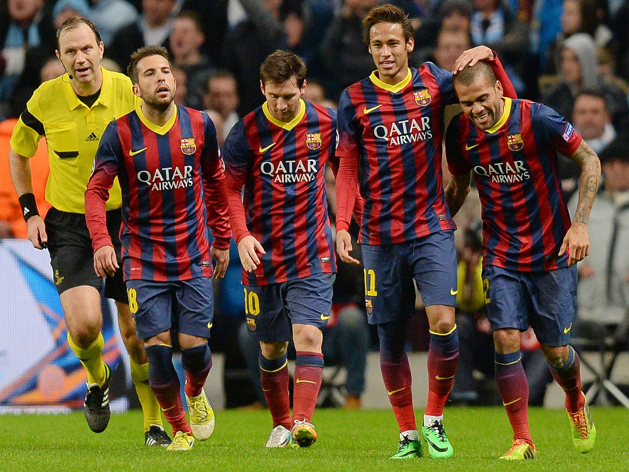 Barcelona players celebrate Dani Alves' goal - which may have put the tie beyond Manchester City