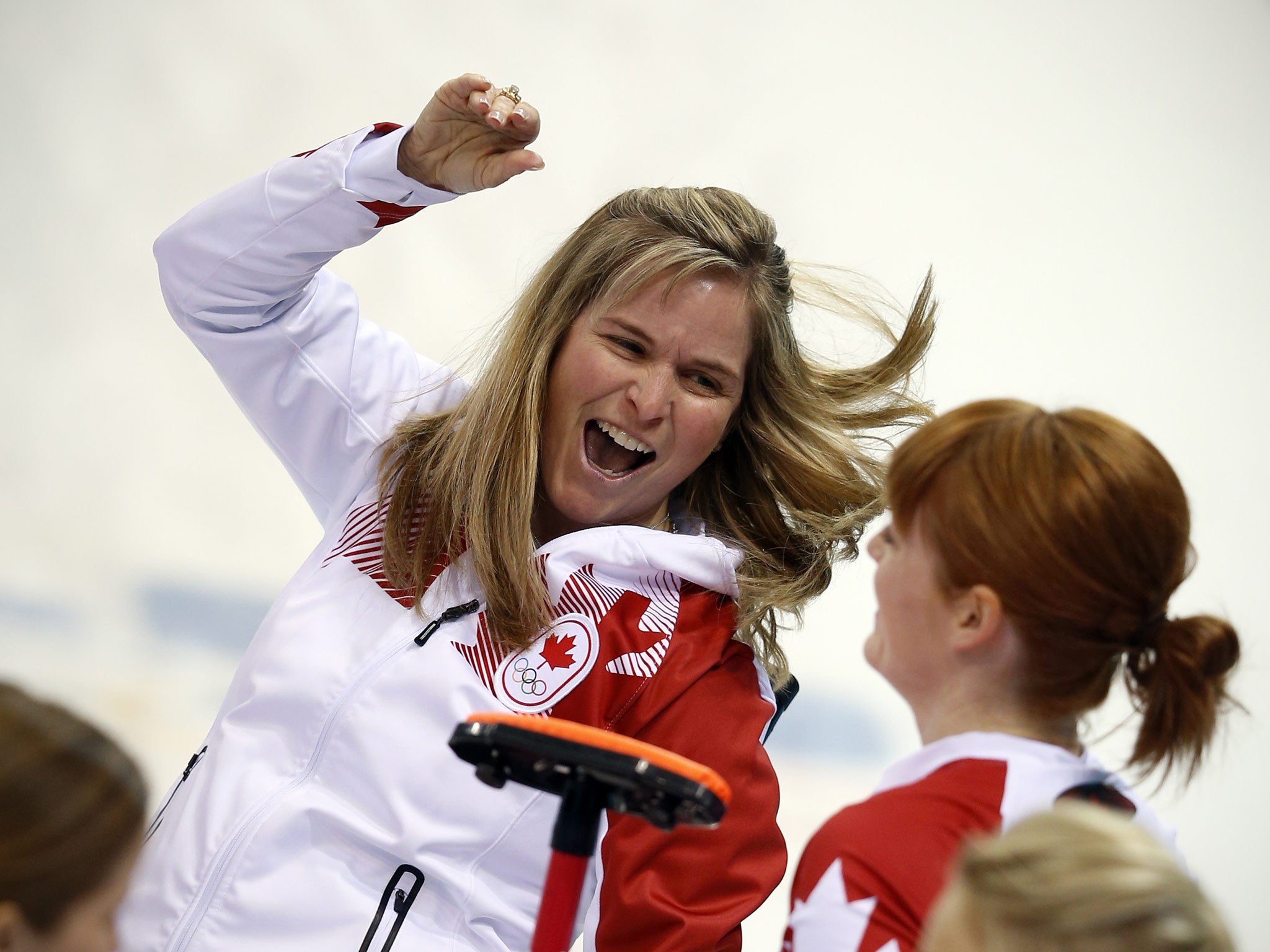 Canada's Skip Jennifer Jones celebrates after throwing the last stone to win the game against Team GB