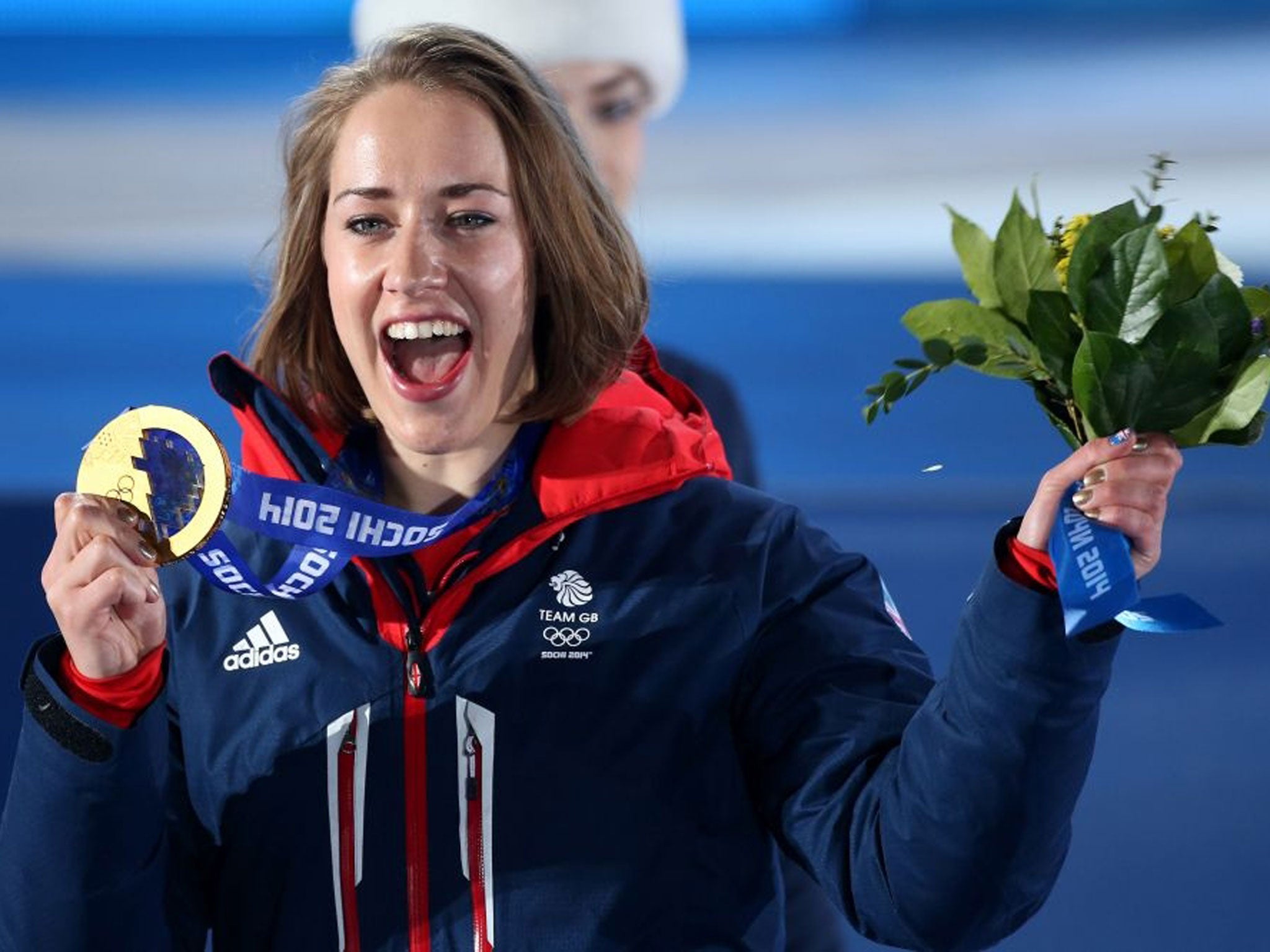 Lizzie Yarnold with the Gold medal she won in the Women's Skeleton