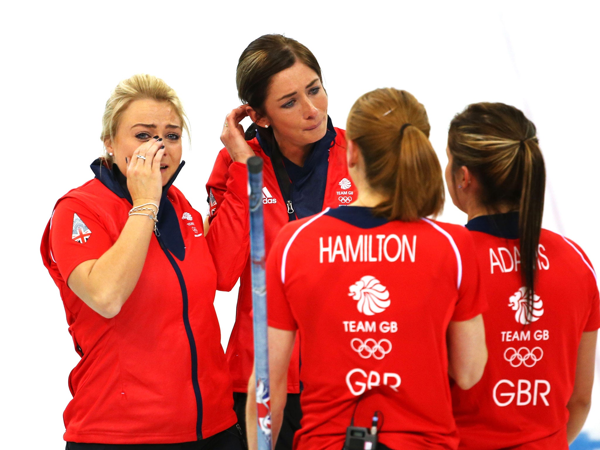 Great Britain's Anna Sloan, Eve Muirhead, Vicki Adams and Claire Hamilton celebrate after winning the Women's Curling Bronze Medal Game at the Ice Cube Curling Center