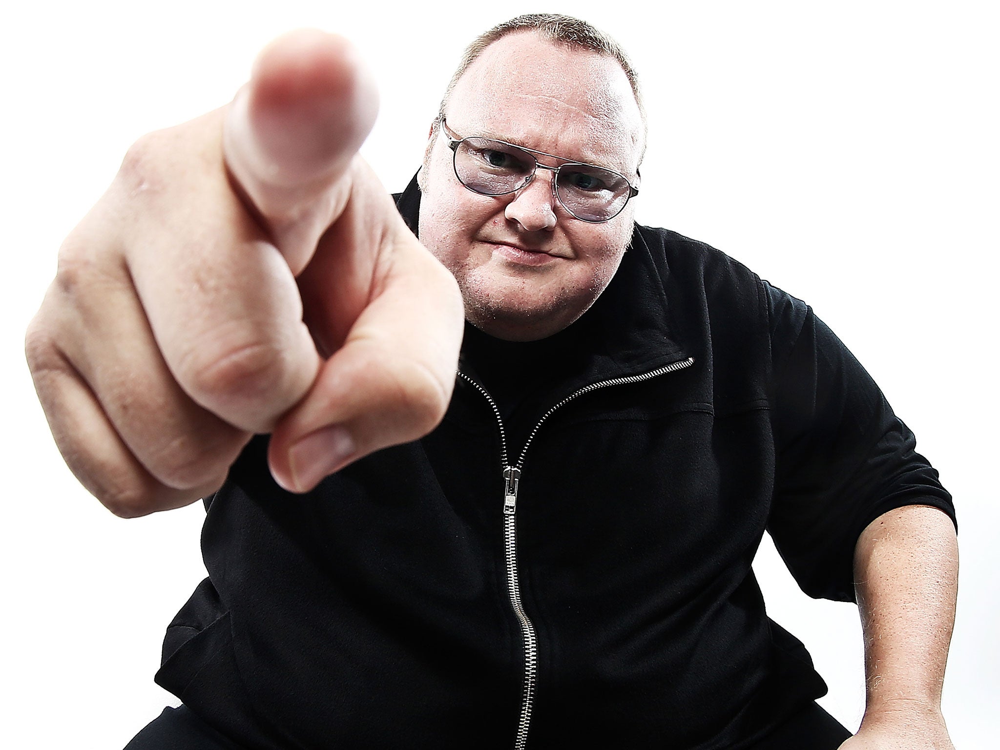 MEGA Limited founder, Kim Dotcom poses at the Dotcom Mansion.