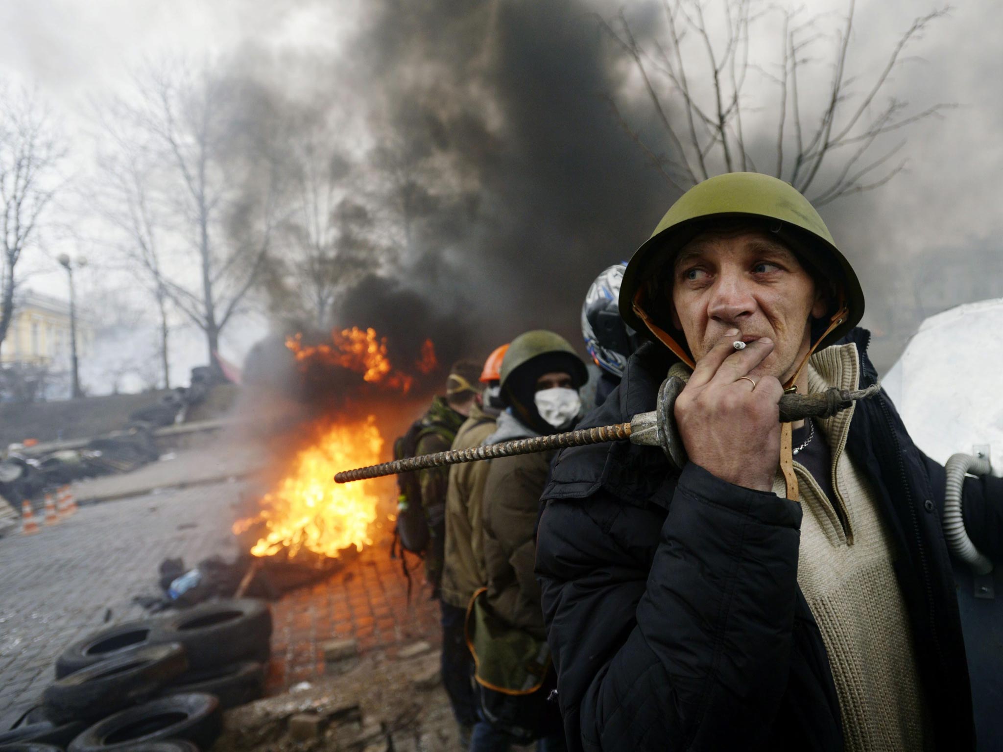 Protesters shape a defence line in Kiev, Ukraine