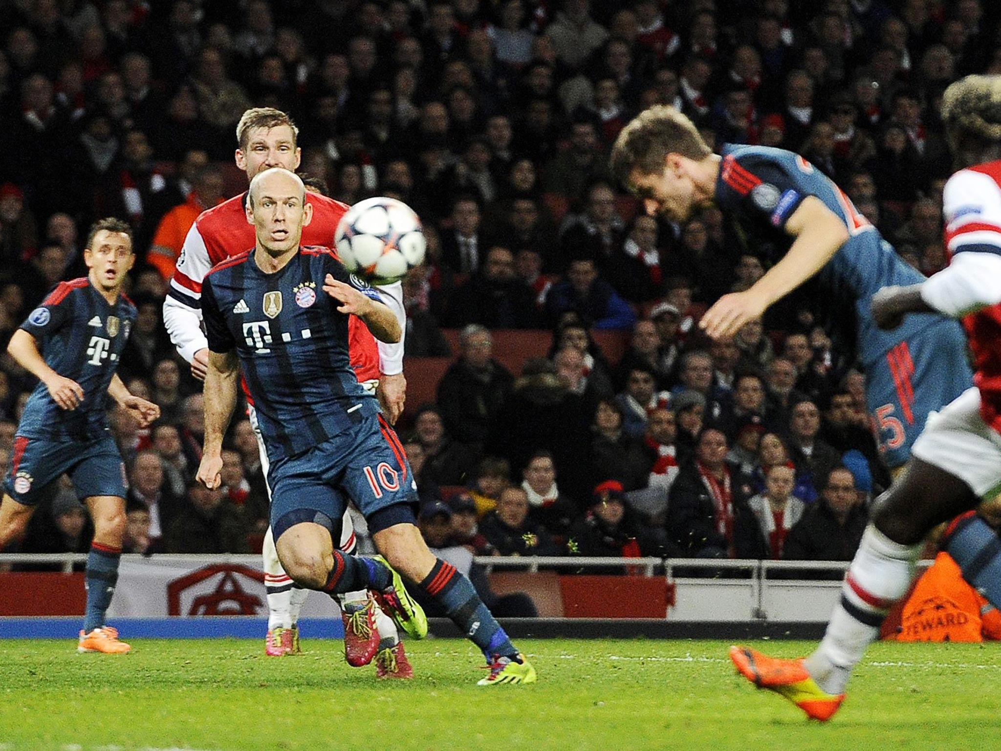 Thomas Müller scores Bayern Munich’s second goal to leave Arsenal on the brink of elimination