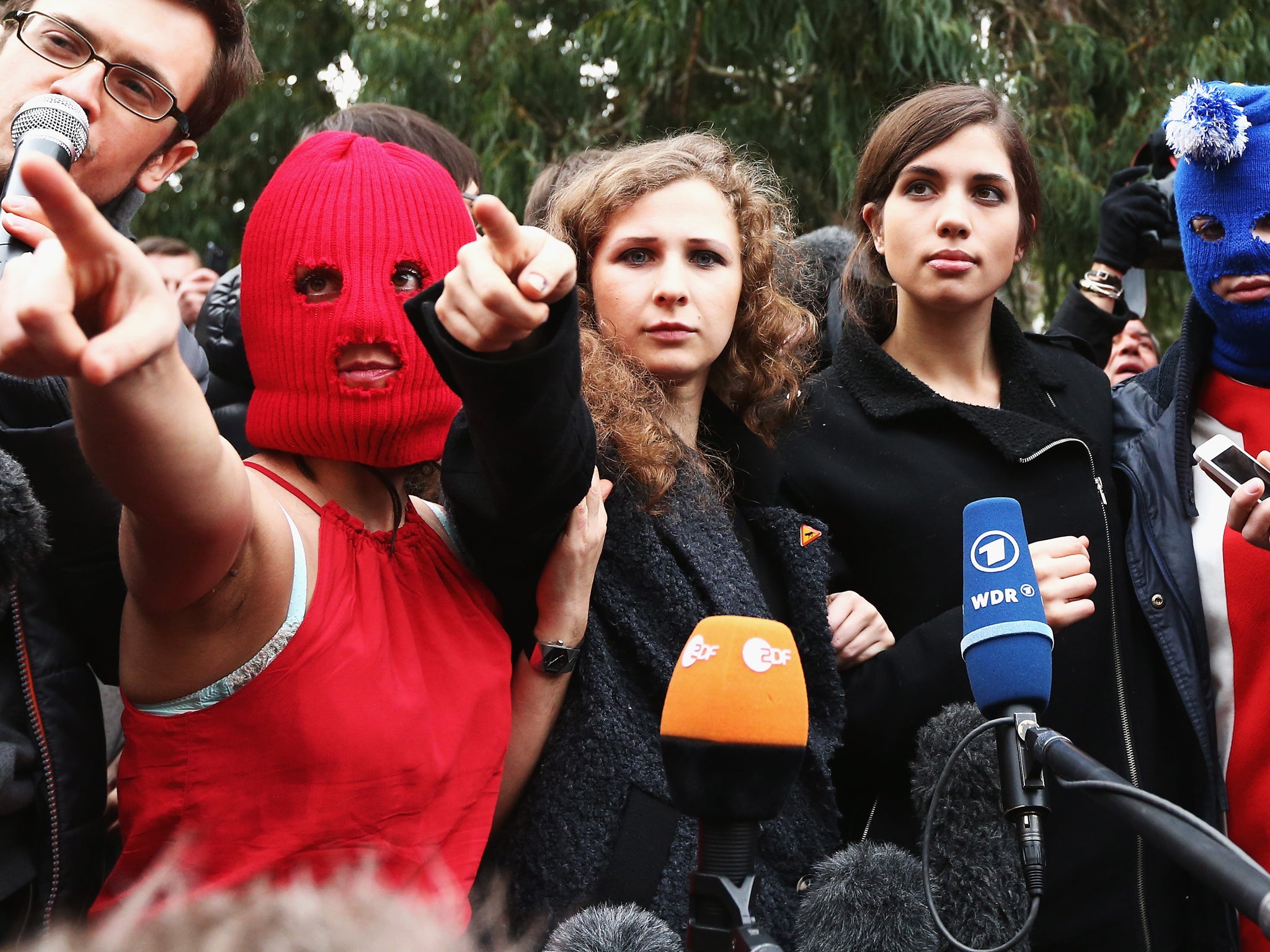 Members of protest group Pussy Riot speak during a press conference on February 20, 2014 in Sochi, Russia.