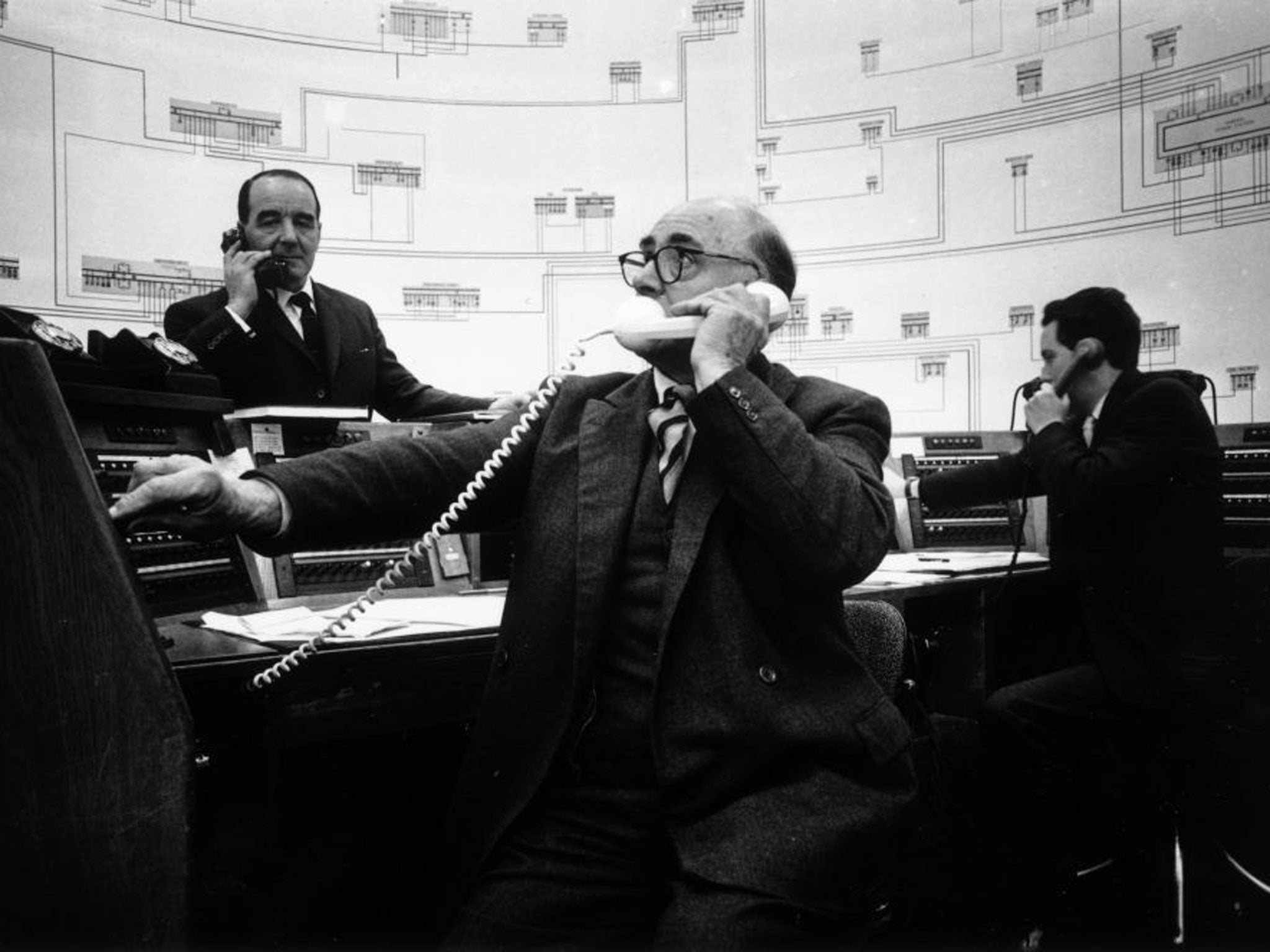 Blacking out: Staff prepare for a power cut at a control centre in 1953. Now it is the energy of consumers that is being tested