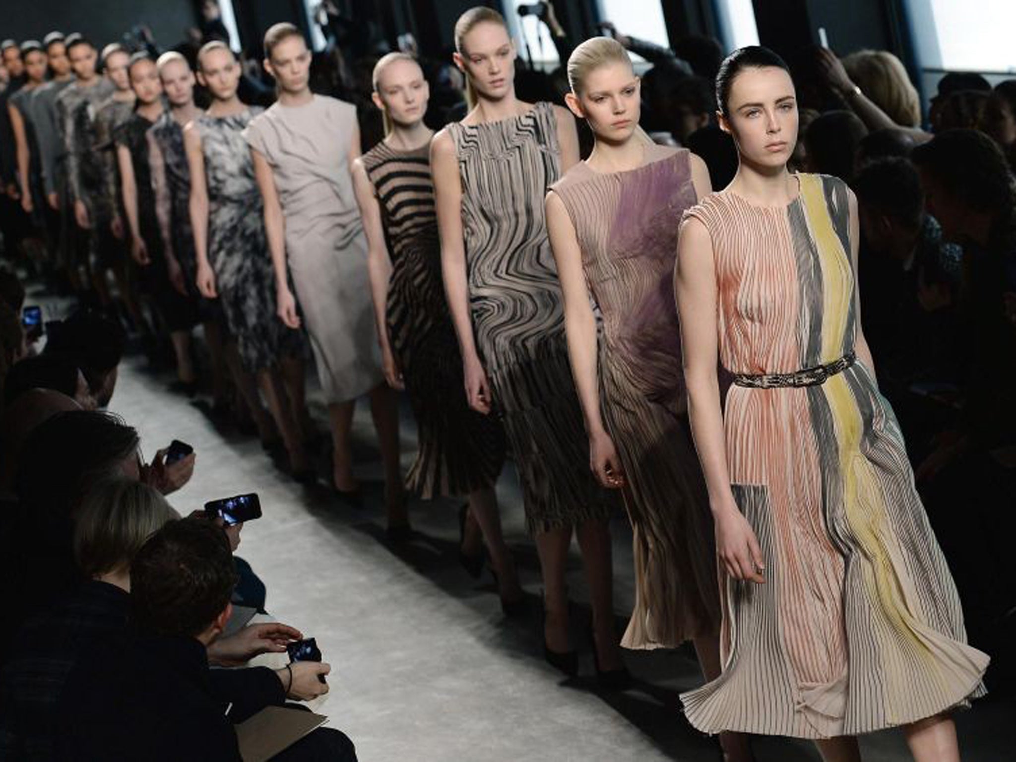 Abstracted stripes and optical patterns bisect wool crepe and jersey dresses at Bottega Veneta