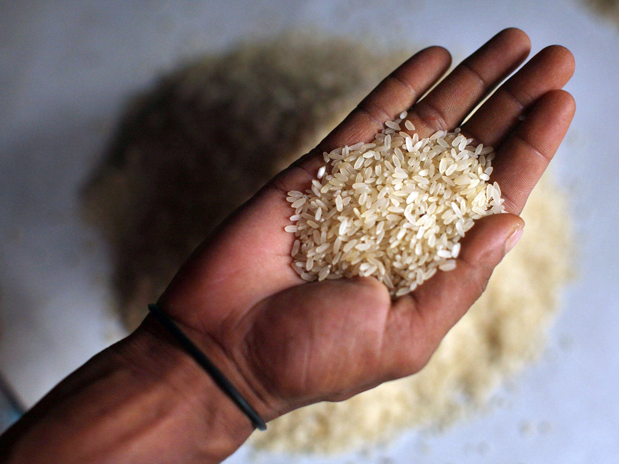 Lion Mountains sells 50kg bags of rice to market stall holders for about to each, with the local community given a share of the profit.