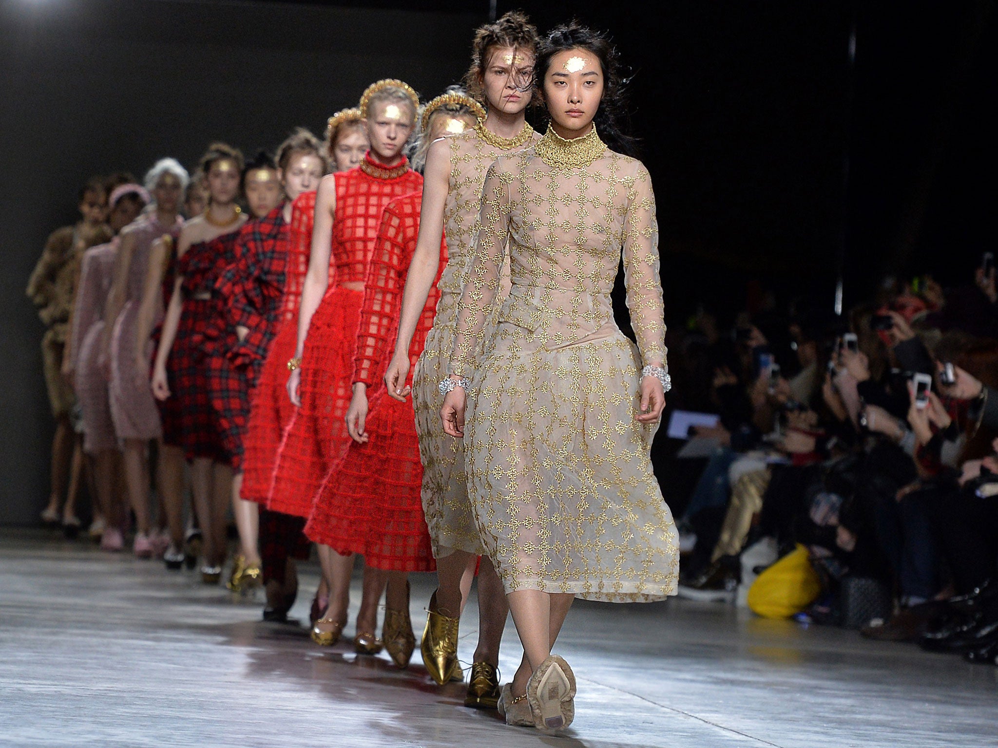 Models present creations from designer Simone Rocha (AFP/Getty Images)