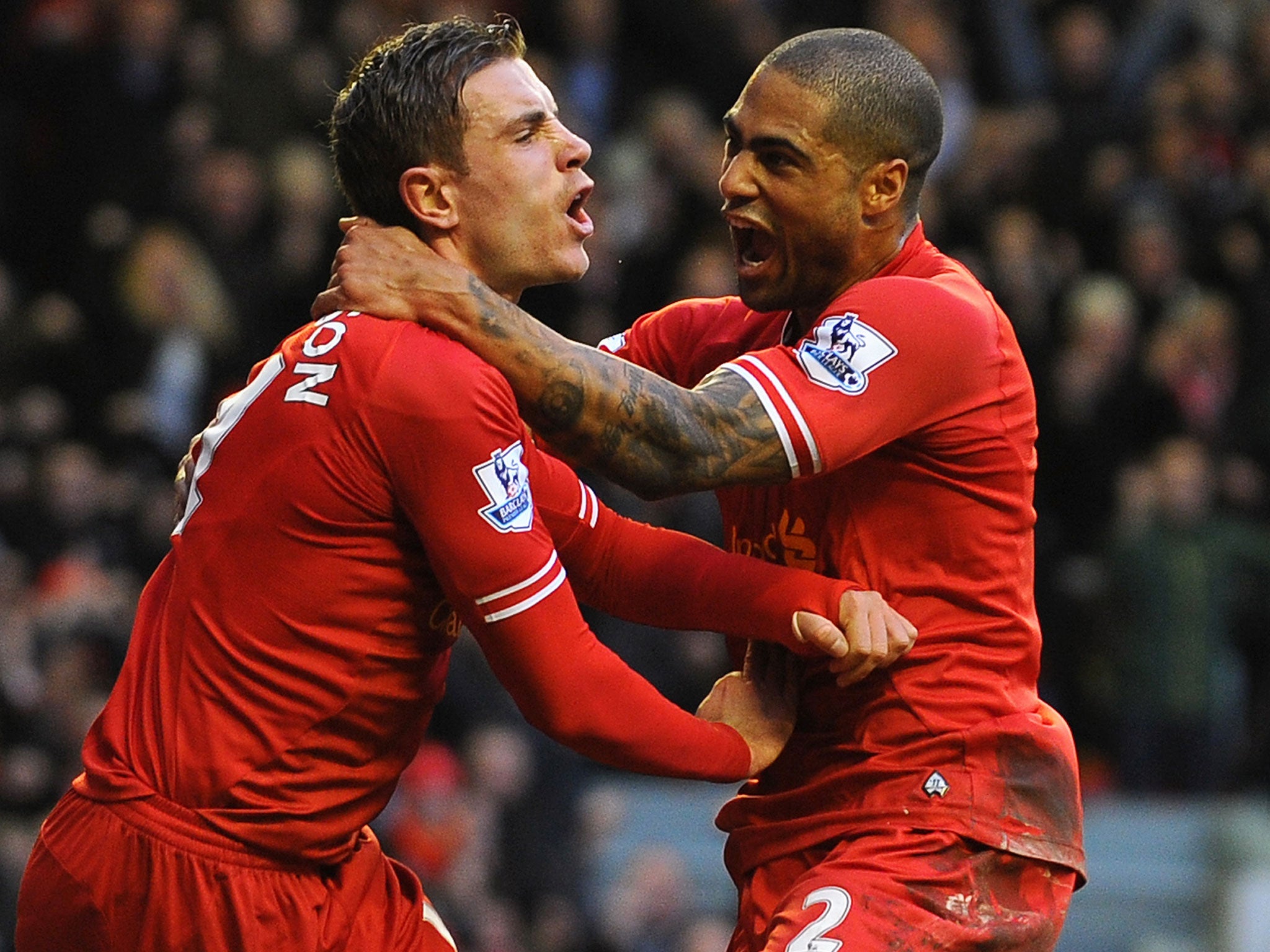 Jordan Henderson (left) celebrates his second, and Liverpool's fourth, against Swansea with Glen Johnson