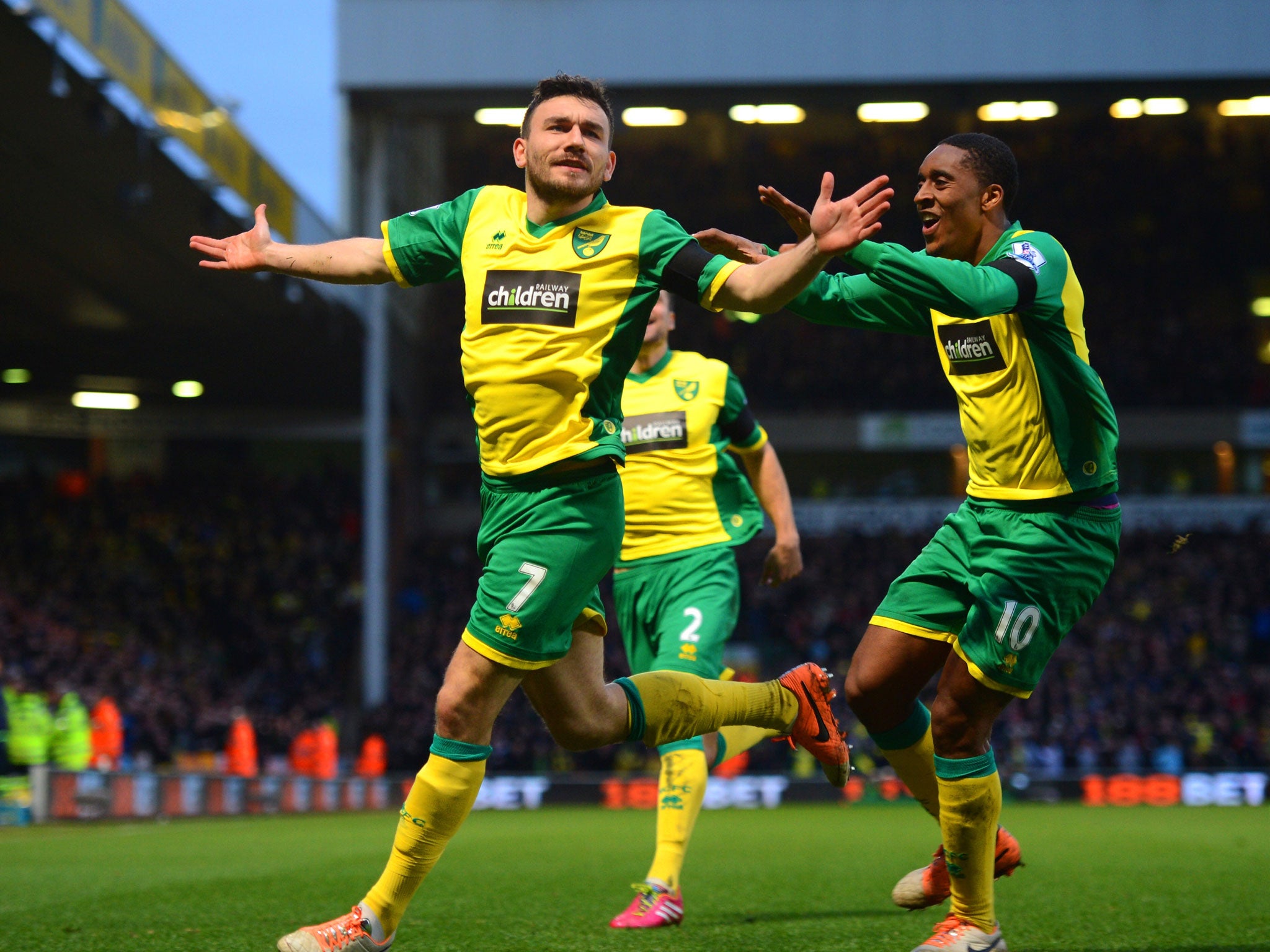 Robert Snodgrass (left) celebrates his winning goal with Leroy Fey