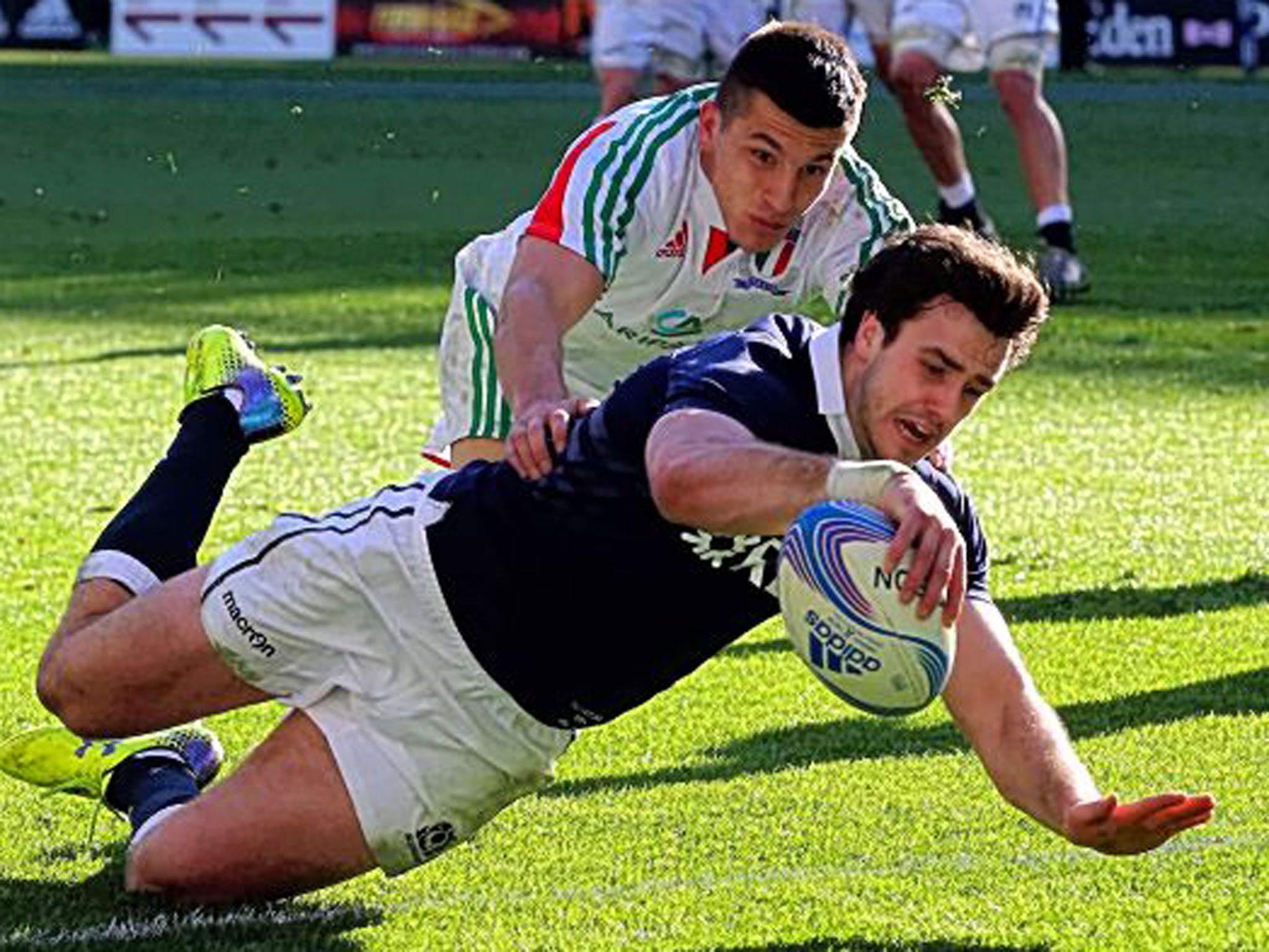 Alex Dunbar scores the first of his two tries against Italy