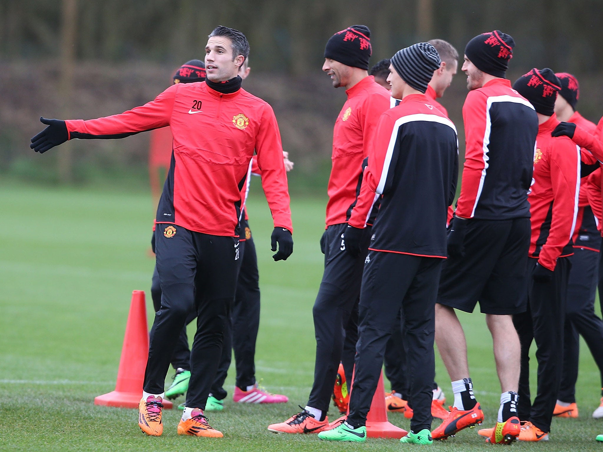 Robin van Persie of Manchester United in action during a first team training session, ahead of their UEFA Champions League Round of 16 match against Olympiakos