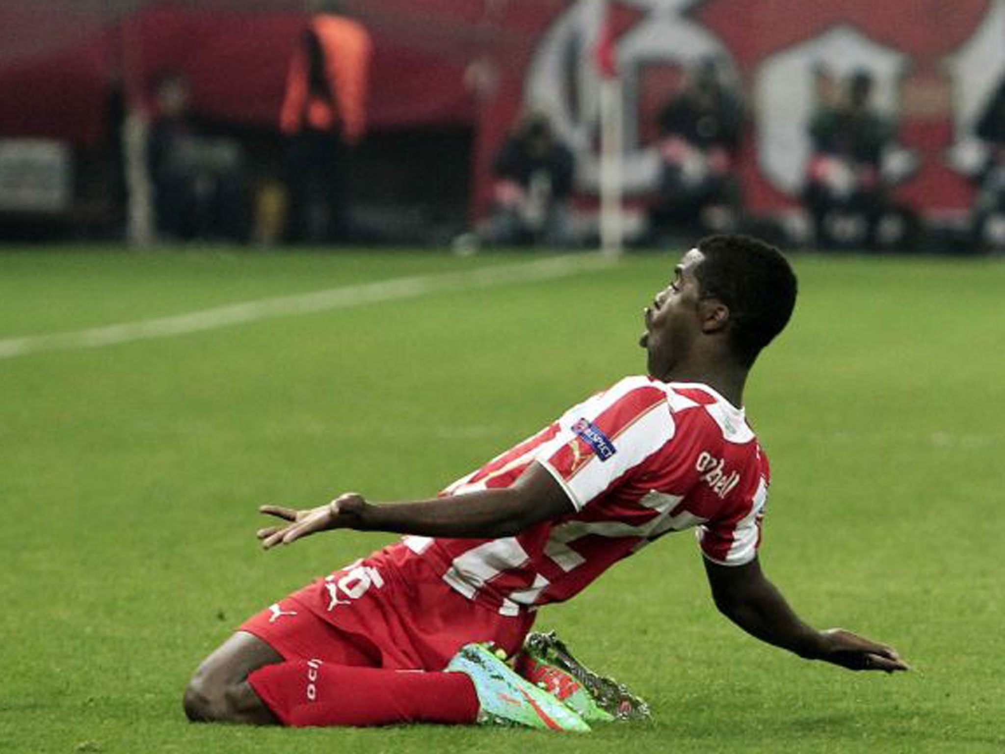 Joel Campbell, on loan from Arsenal, celebrates his goal against Manchester United...with more than a nod to Thierry Henry