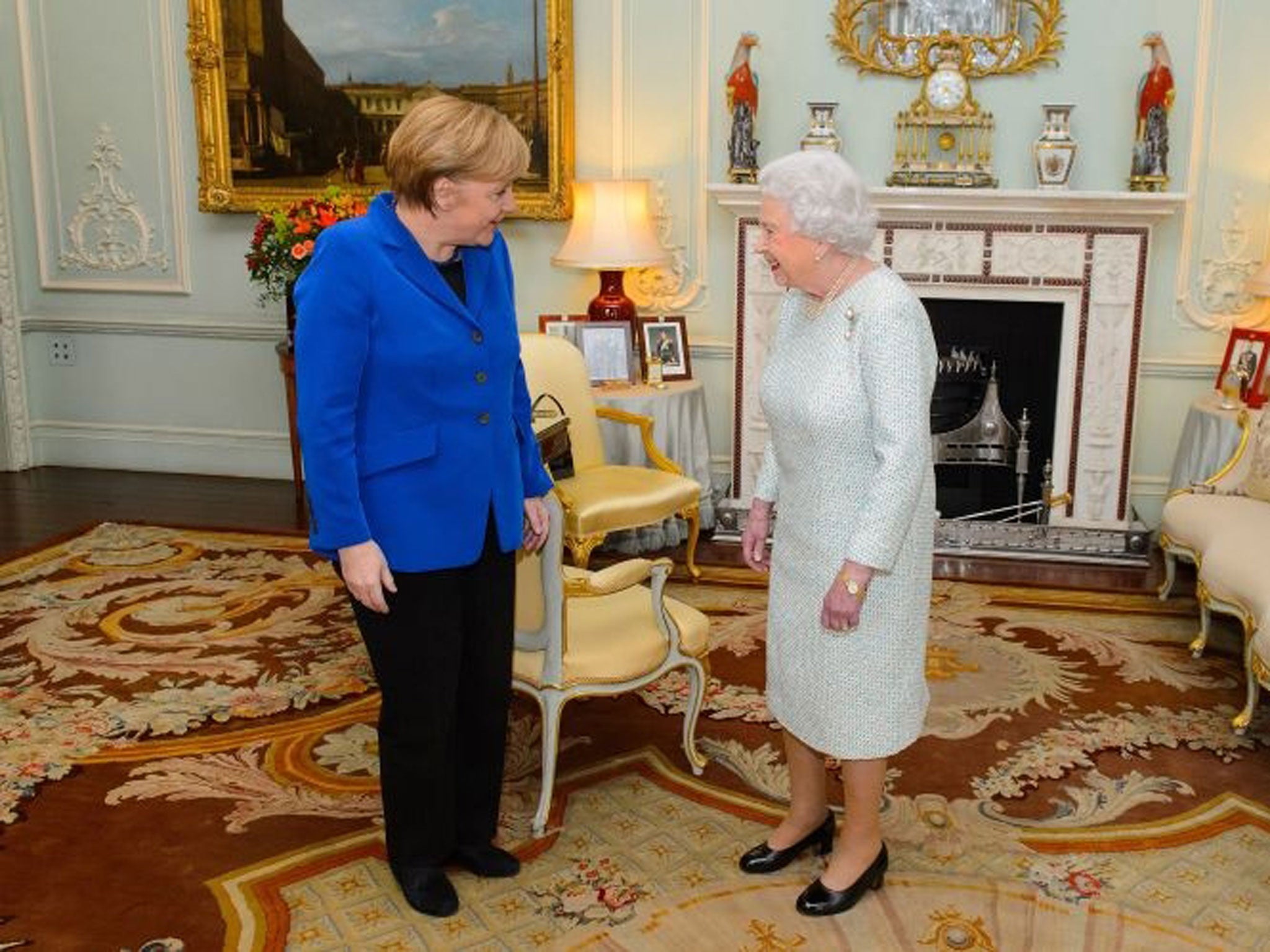 Britain's Queen Elizabeth II (R) meets German Chancellor Angela Merkel (L) at Buckingham Palace.