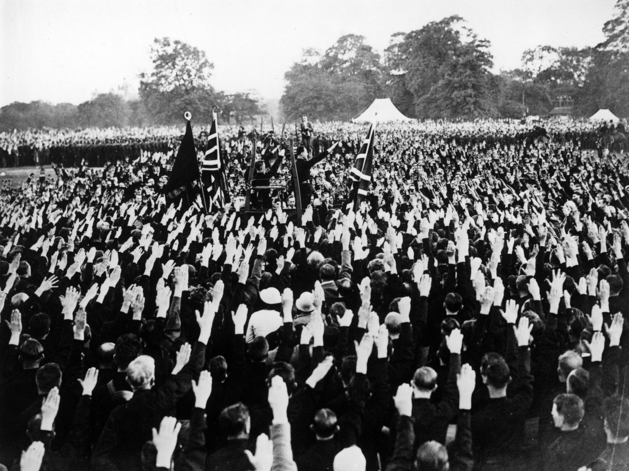 British fascist leader Oswald Mosley taking the salute in the middle of a fascist demonstration in Hyde Park 1934