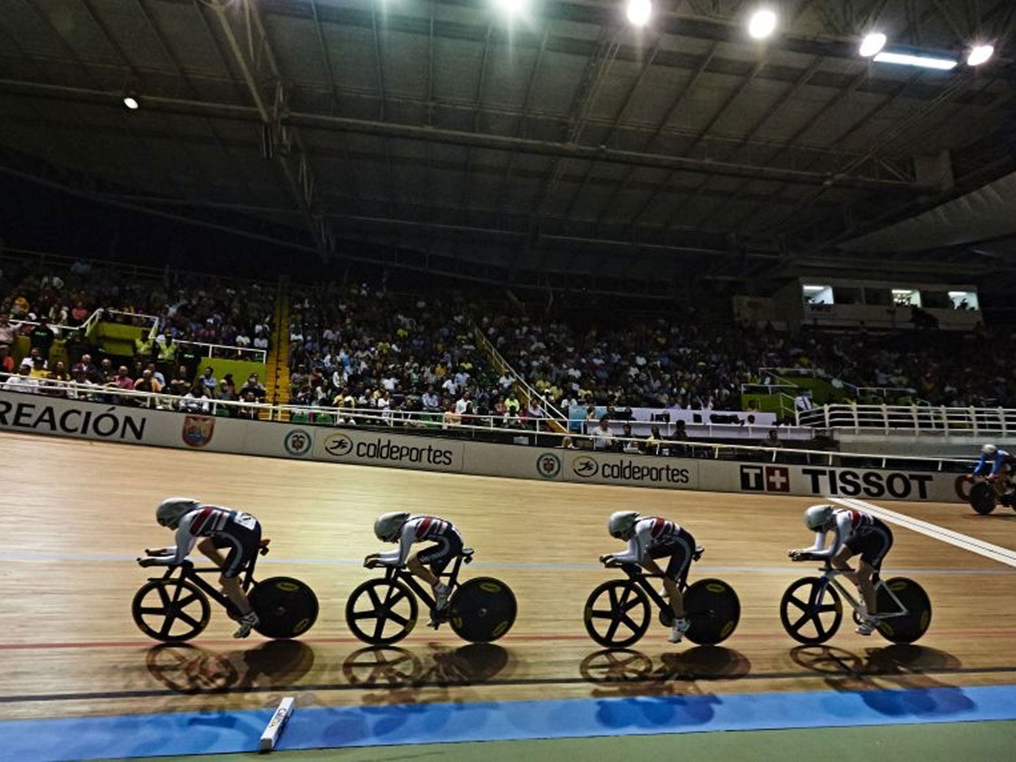 Britain's women's team pursuit squad in formation while defending their world title at the 2014 UCI Track Cycling World Championships in Cali, Colombia